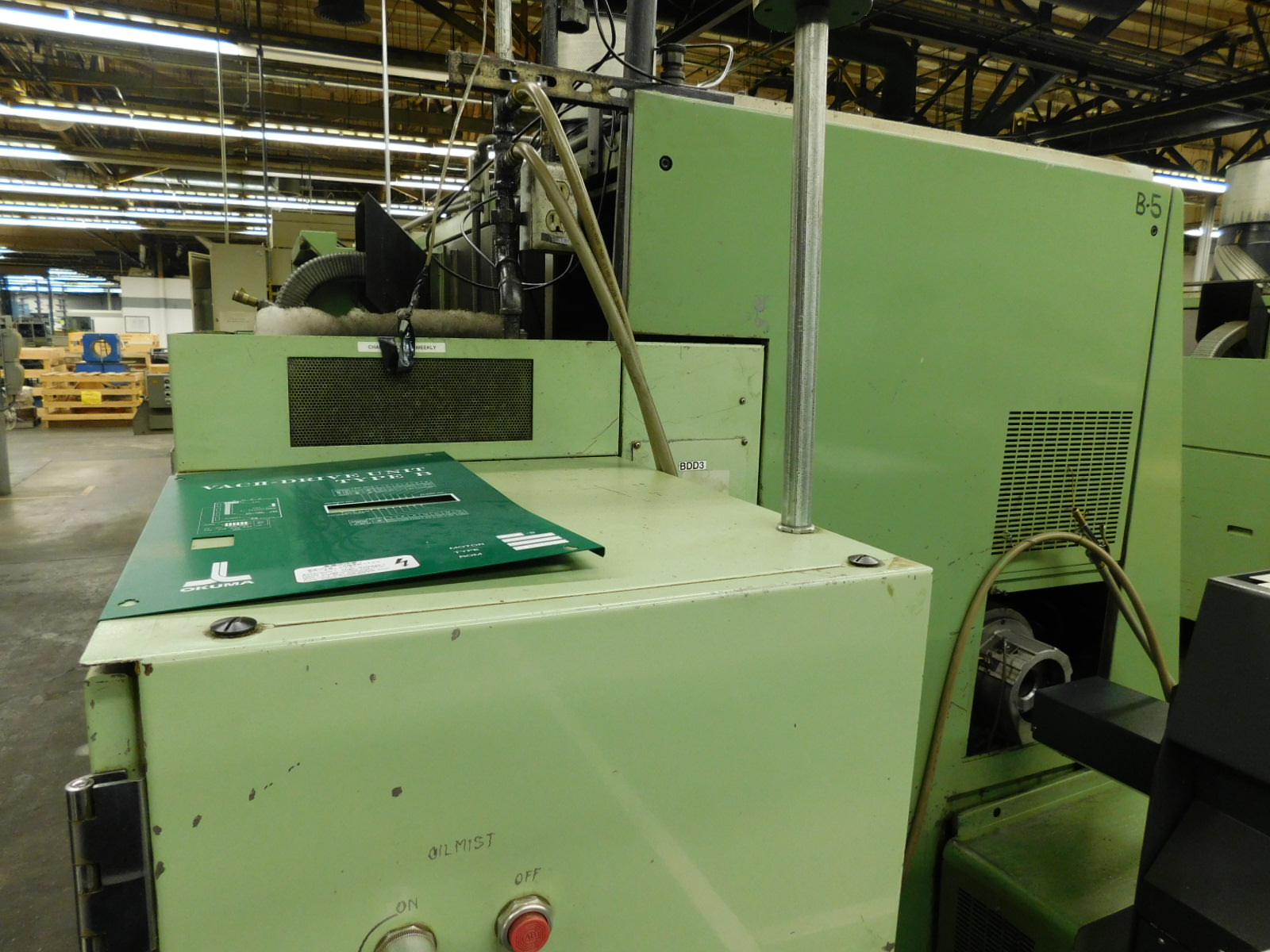 OKUMA LR 15-MW LATHE, OSP 5020L CNC CONTROL, LIVE TOOL, TWIN SPINDLE, HYDRAULIC TAILSTOCK, SUB SPINDLE, PARTS CATCHER, PARTS CONVEYOR, TURBO CHIP CONVEYOR, ROYAL MIST FILTER, METAL BIN, S/N 1780-217