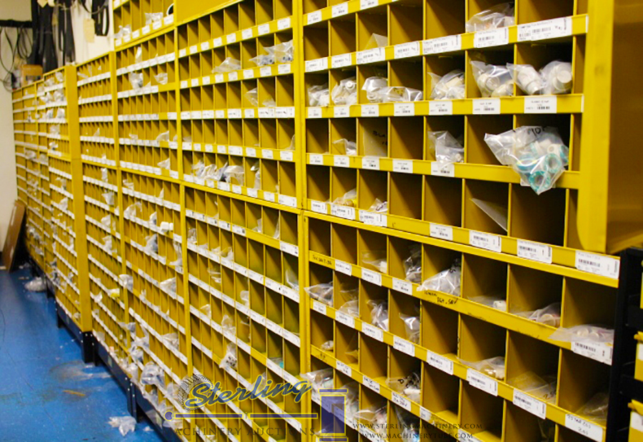 OKUMA CNC LIVE TOOL LATHES, OKUMA HORIZONTAL MACHINING CENTERS, SCREW MACHINES, PLASTIC INJECTION MOLDING, OVENS, MACHINE SHOPS, LARGE TOOL CRIBS, AIR COMPRESSORS, INSPECTION, VIDMAR & LISTA CABINETS, OVER 1,000 LOTS TO BE SOLD!c-1