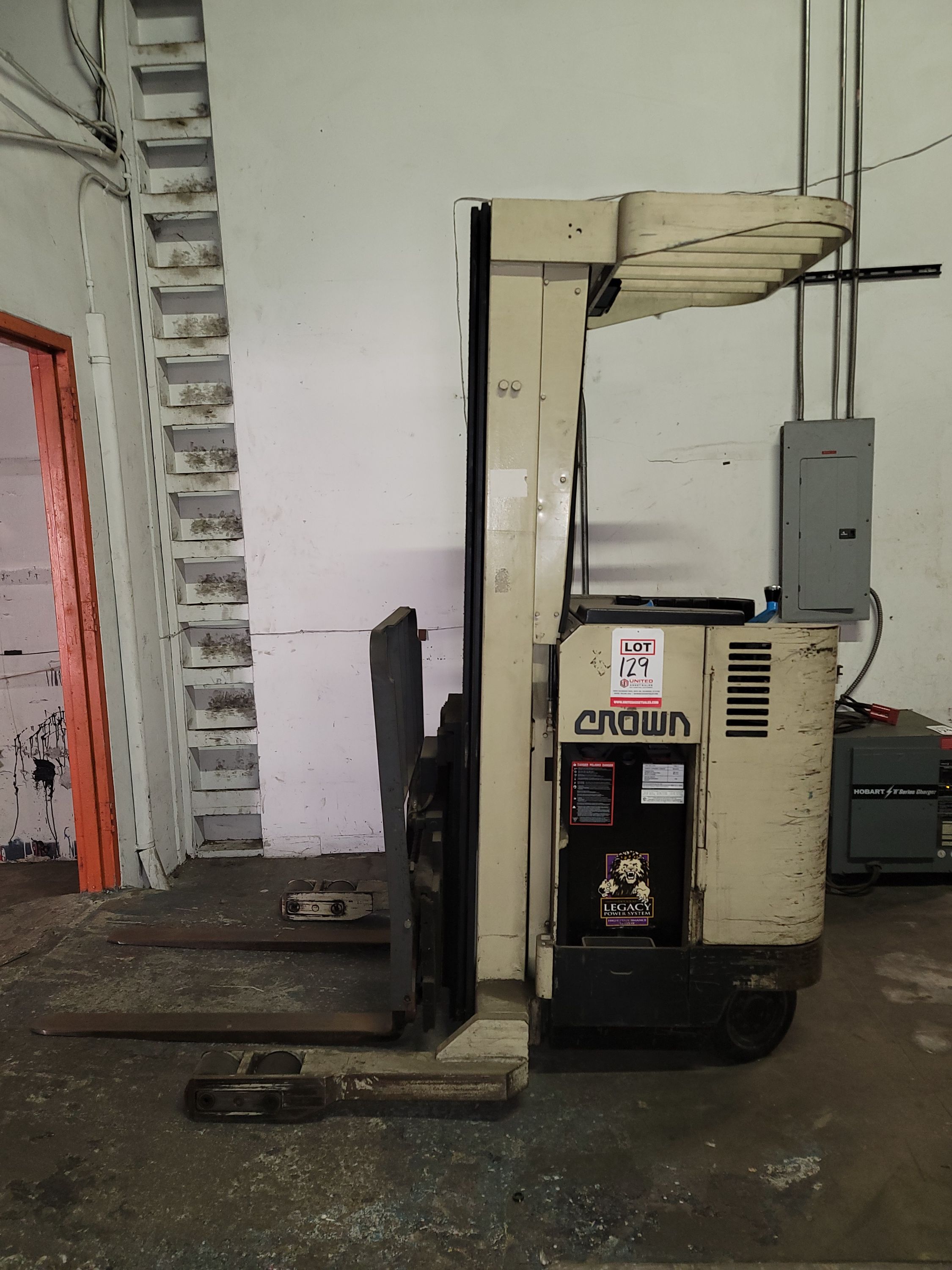 CROWN STAND-UP ELECTRIC FORKLIFT, MODEL 35RRTT, S/N 1A122432, 24V, MAST ID 35RRTT-210, OUT OF SERVICE / NEEDS WORK, W/ HOBART R SERIES 24V CHARGER, MODEL 540B1-12R, S/N 293CS05266 (CHARGER WORKS) FORKLIFT BATTERIES WERE REPLACED NEW 3 YEARS AGO, BUT THAT DID NOT FIX THE PROBLEM-129