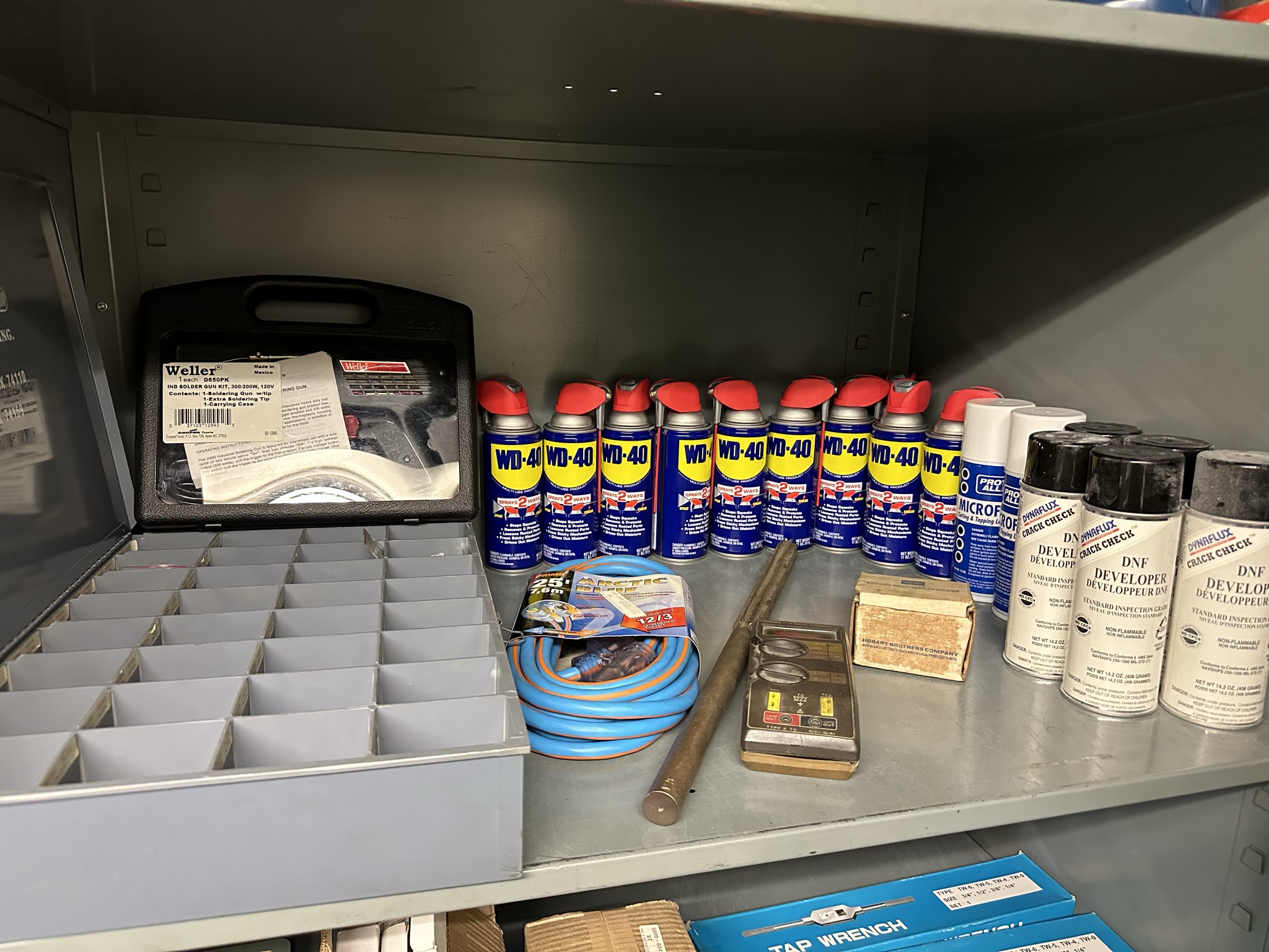 LOT - 2-DOOR STORAGE CABINET, W/ CONTENTS, TO INCLUDE: WELLER INDUSTRIAL 300/200 WATT SOLDER GUN KIT, WESCO TOOL MIST COOLANT GENERATOR, TAP WRENCHES, WD-40, STEEL BLUE LAYOUT FLUID, ETC.-498