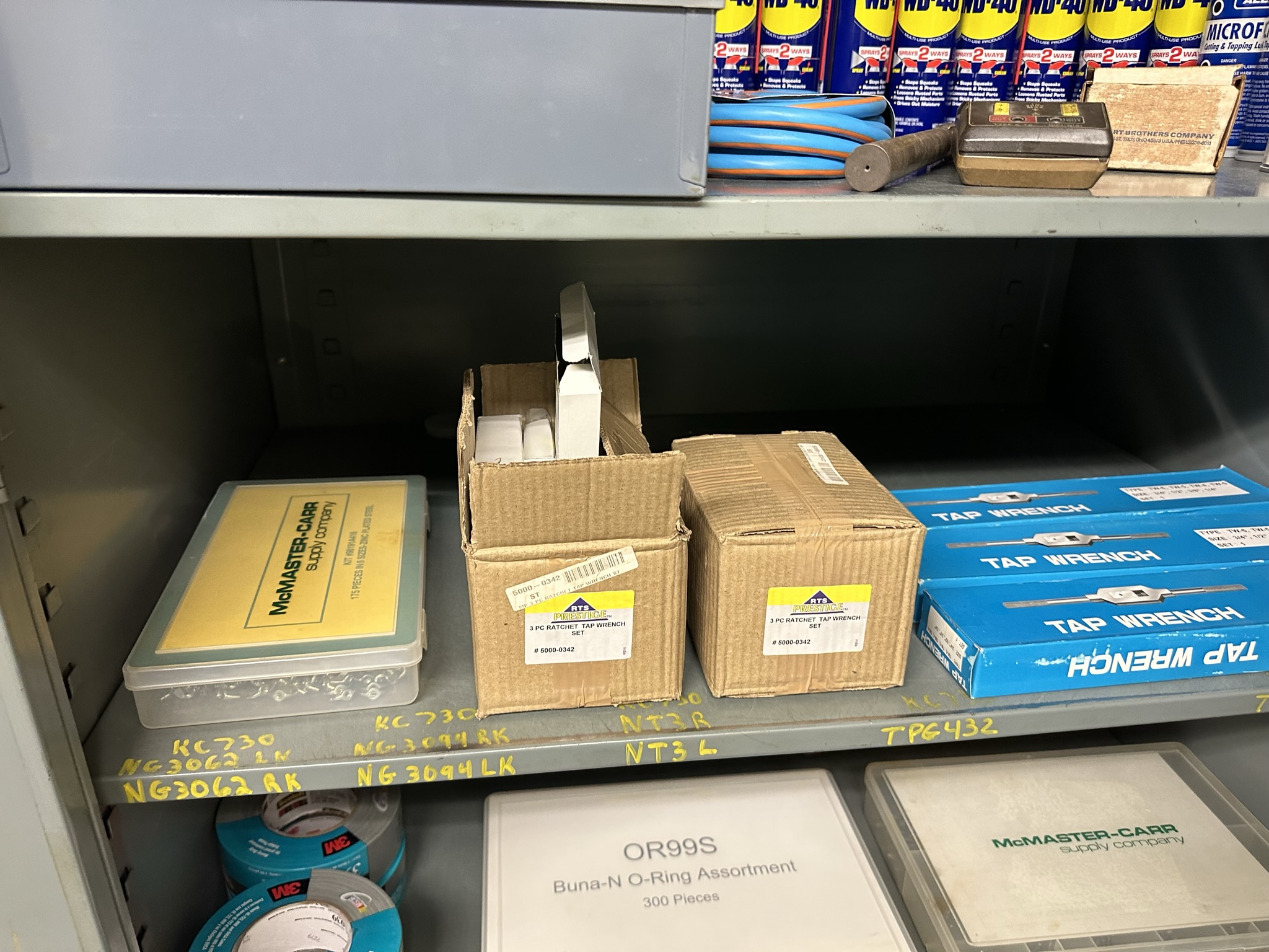 LOT - 2-DOOR STORAGE CABINET, W/ CONTENTS, TO INCLUDE: WELLER INDUSTRIAL 300/200 WATT SOLDER GUN KIT, WESCO TOOL MIST COOLANT GENERATOR, TAP WRENCHES, WD-40, STEEL BLUE LAYOUT FLUID, ETC.-498
