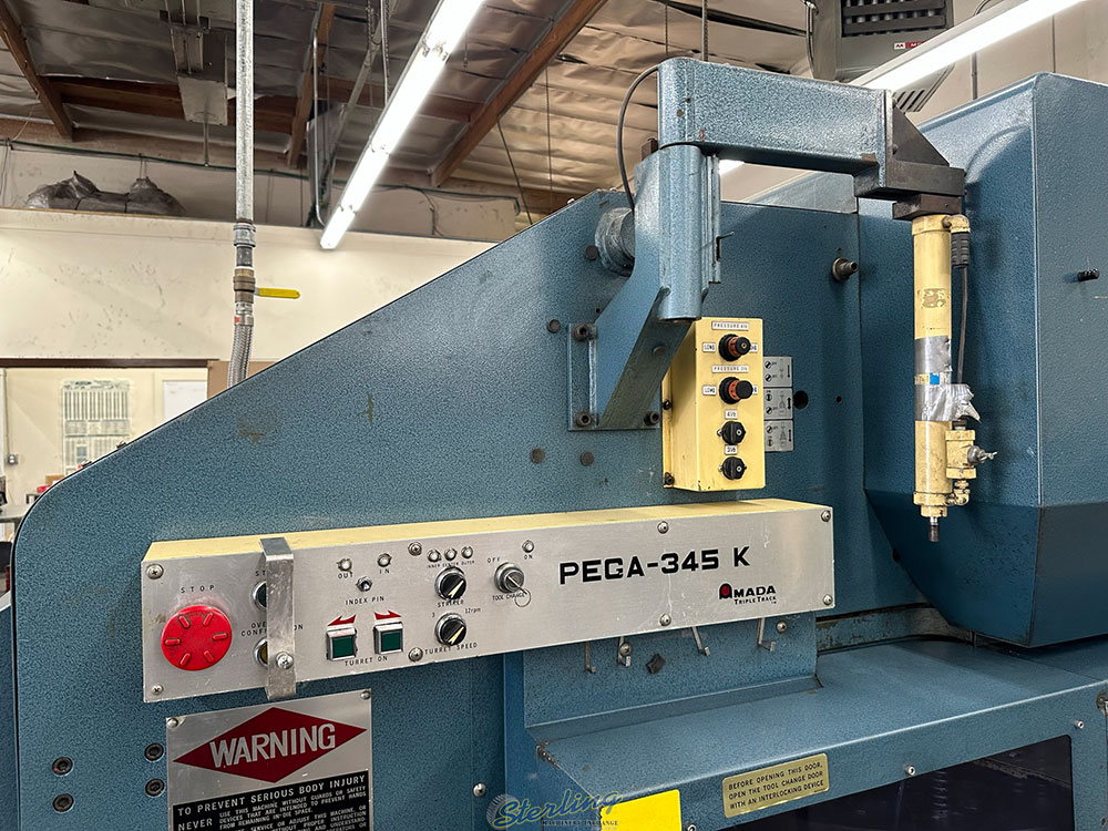 1985 AMADA TURRET PUNCH PRESS MODEL PEGA 345 KING 30 TON 58 STATION 40inch X 50inch SHEET SIZE THICK TURRET BALL TABLE FANUC P 6M CNC CONTROL UNISORB VIBRATION ISOLATION PADS NEW CLUTCH AND BRAKE INSTALLED APPROX. 1 YEAR AGO S N AK450018-31