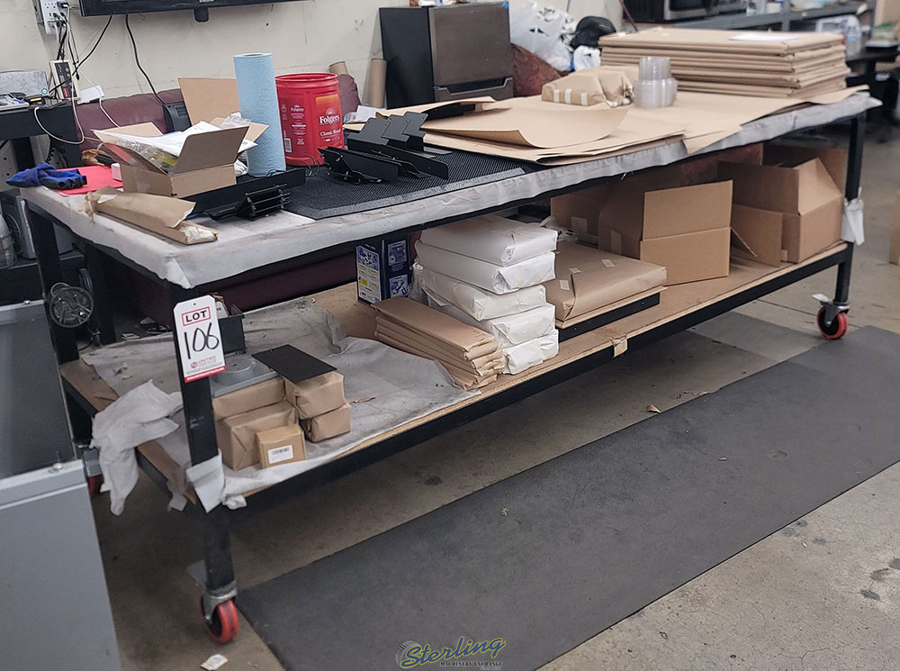 WORKBENCH ON CASTERS W  WOOD TOP 3 ft X 8 ft CONTENTS NOT INCLUDED-106