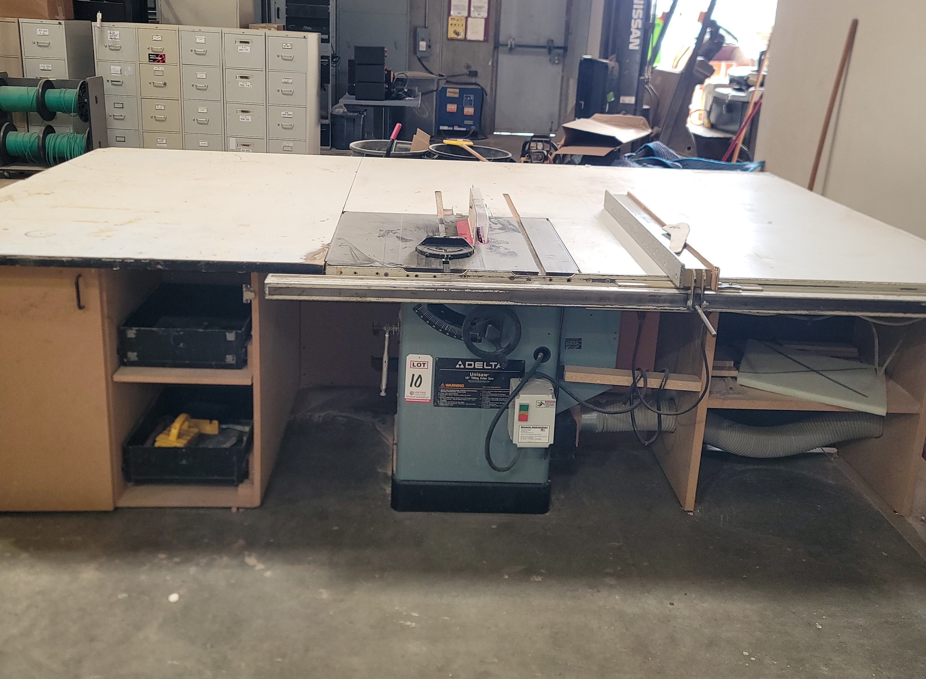 DELTA 10" UNISAW TABLE SAW, CAT. NO. 36-815, 3 HP, 230V, 28" X 27" CAST TABLE, 40-1/2" FENCE, S/N 93H94175, WITH OR WITHOUT SURROUNDING MATERIAL SUPPORT TABLES-10