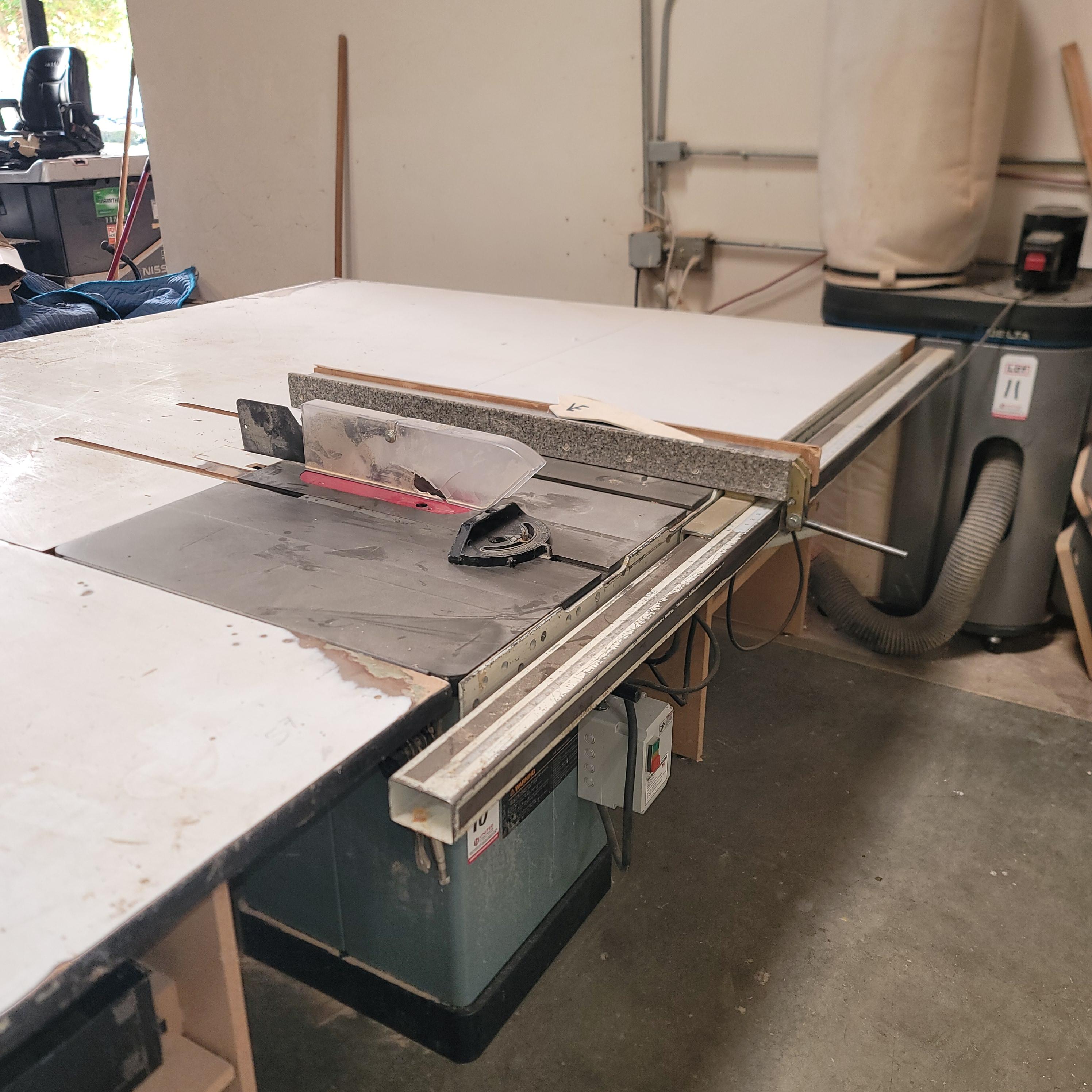 DELTA 10" UNISAW TABLE SAW, CAT. NO. 36-815, 3 HP, 230V, 28" X 27" CAST TABLE, 40-1/2" FENCE, S/N 93H94175, WITH OR WITHOUT SURROUNDING MATERIAL SUPPORT TABLES-10