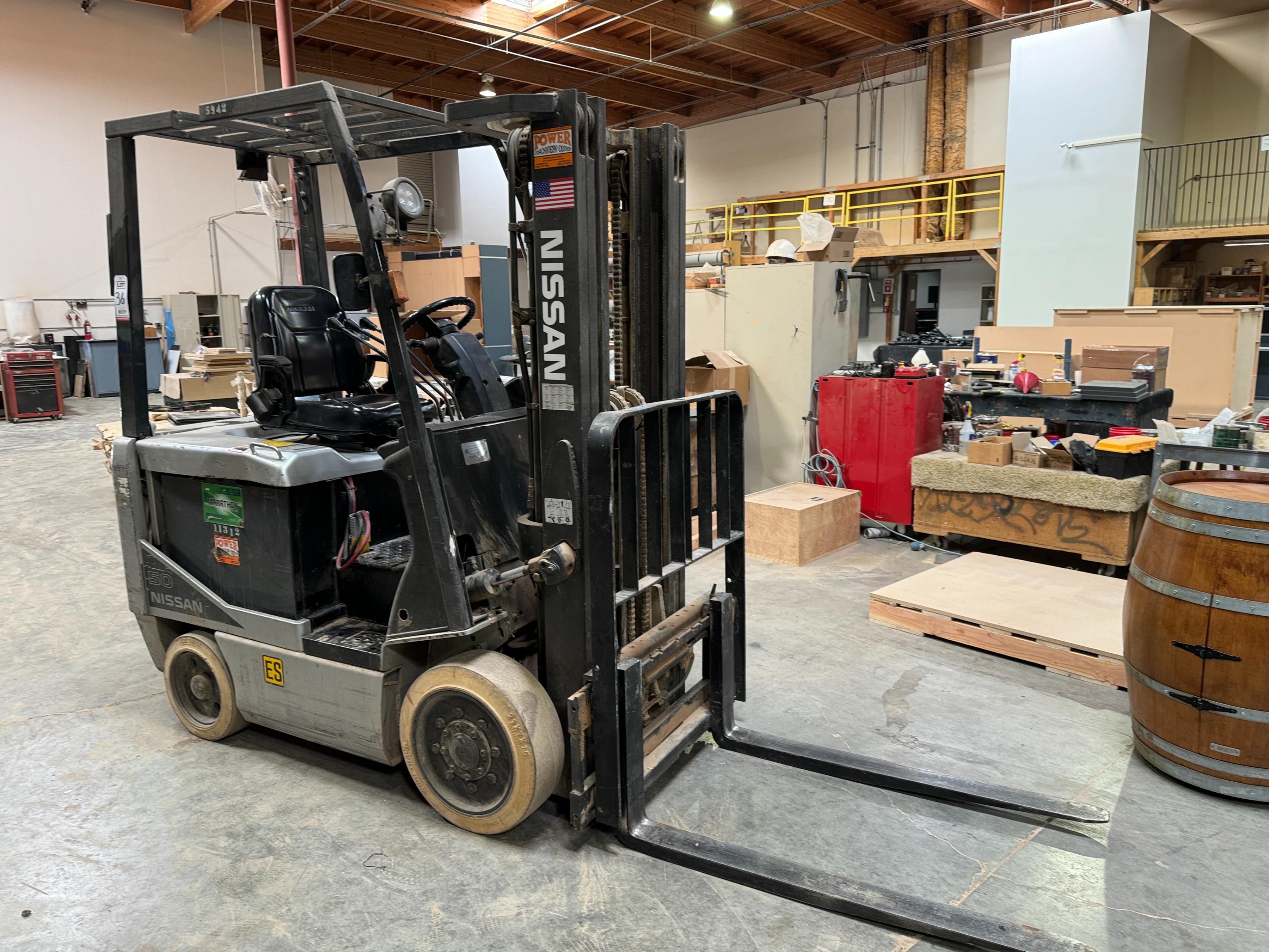 NISSAN ELECTRIC FORKLIFT, MODEL CP1B2L25S, 4,000 LB CAPACITY, 3-STAGE MAST, SIDE SHIFT, SOLID TIRES, 4' FORKS, LOAD LIGHTS, APPROX. 11,751 HOURS, S/N CP1B2-000219, W/ POWERHOUSE BATTERY CHARGER, (DELAYED PICKUP UNTIL FEBRUARY 20)-36