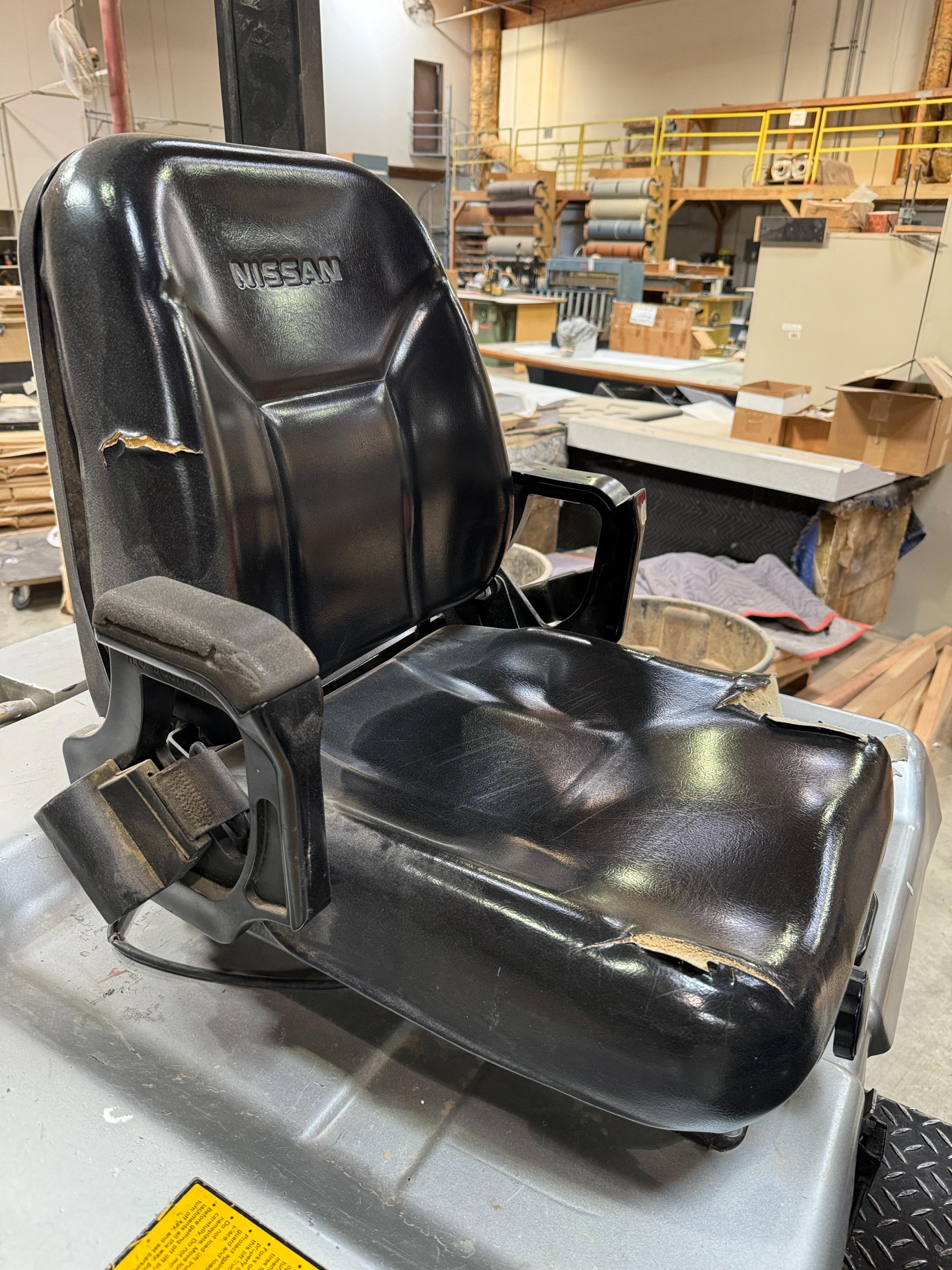 NISSAN ELECTRIC FORKLIFT, MODEL CP1B2L25S, 4,000 LB CAPACITY, 3-STAGE MAST, SIDE SHIFT, SOLID TIRES, 4' FORKS, LOAD LIGHTS, APPROX. 11,751 HOURS, S/N CP1B2-000219, W/ POWERHOUSE BATTERY CHARGER, (DELAYED PICKUP UNTIL FEBRUARY 20)-36