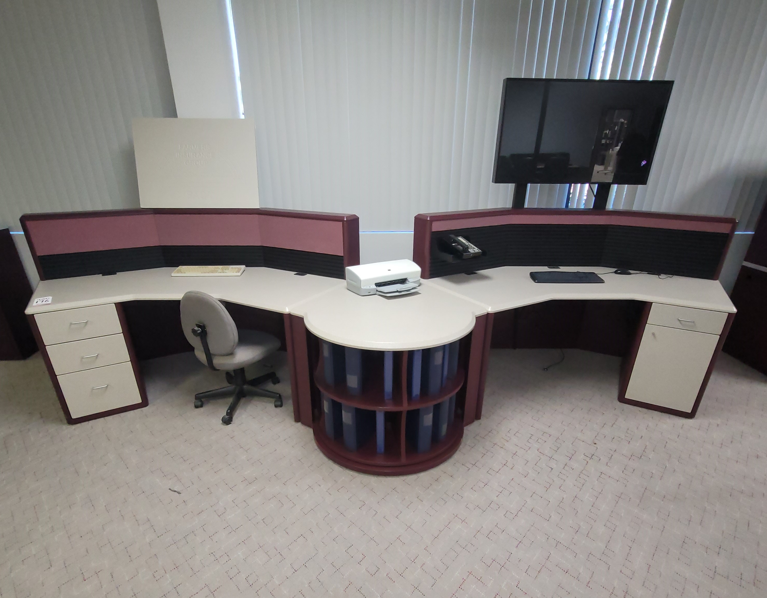 COCKPIT STYLE GULLWING CONSOLE CONFIGURATION W/ DOCUMENT CAROUSEL TRANSITION, DRAWER PEDESTALS, CHAMBERED SLATWALL & 46" LCD SCREEN, COLOR: GRANITE & SANGRIA-176