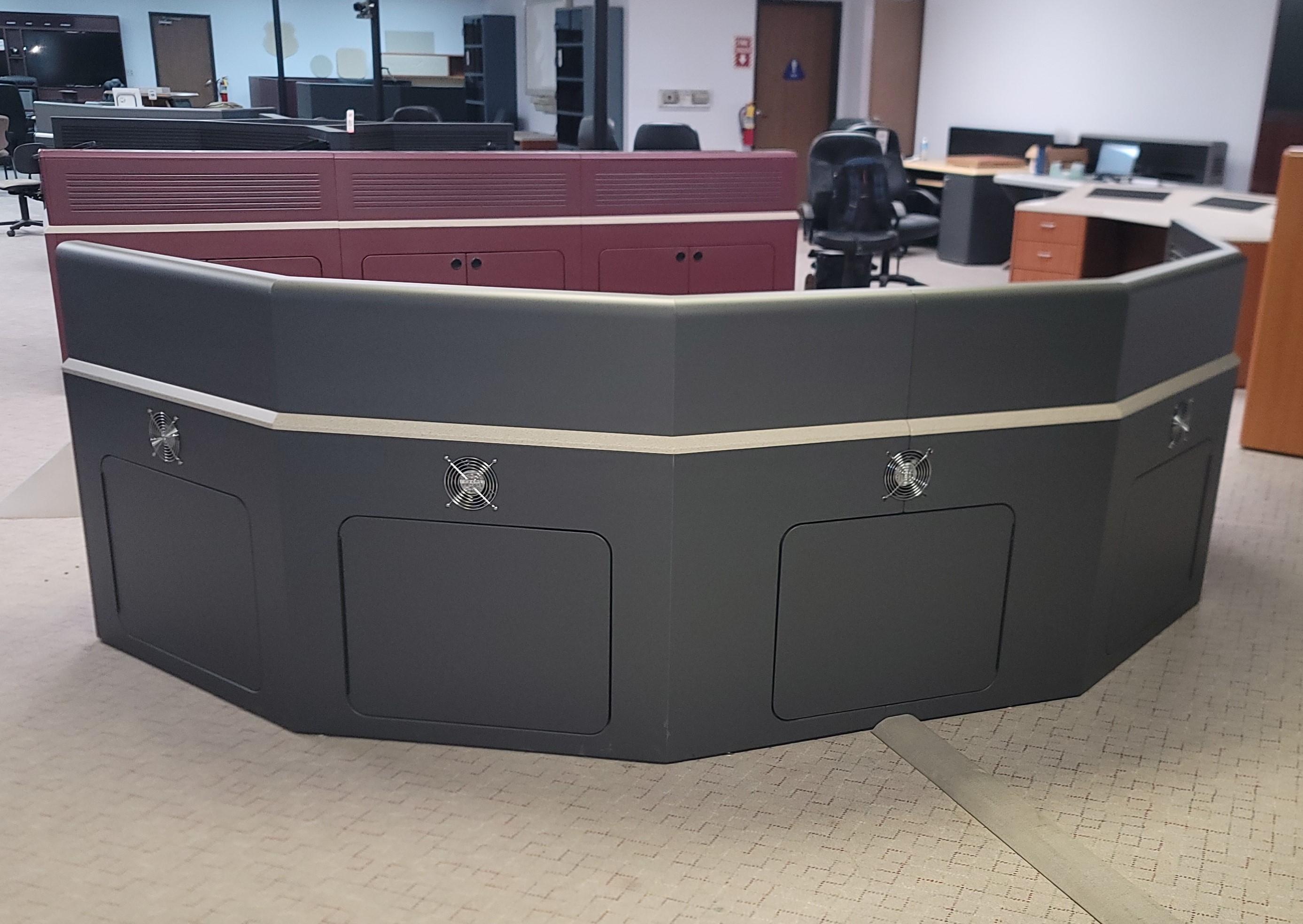 COCKPIT STYLE GULLWING CONSOLE CONFIGURATION W/ SLATWALLS AND PIE-SHAPED STORAGE TRANSITION, COLOR: GRANITE & WROUGHT IRON-180