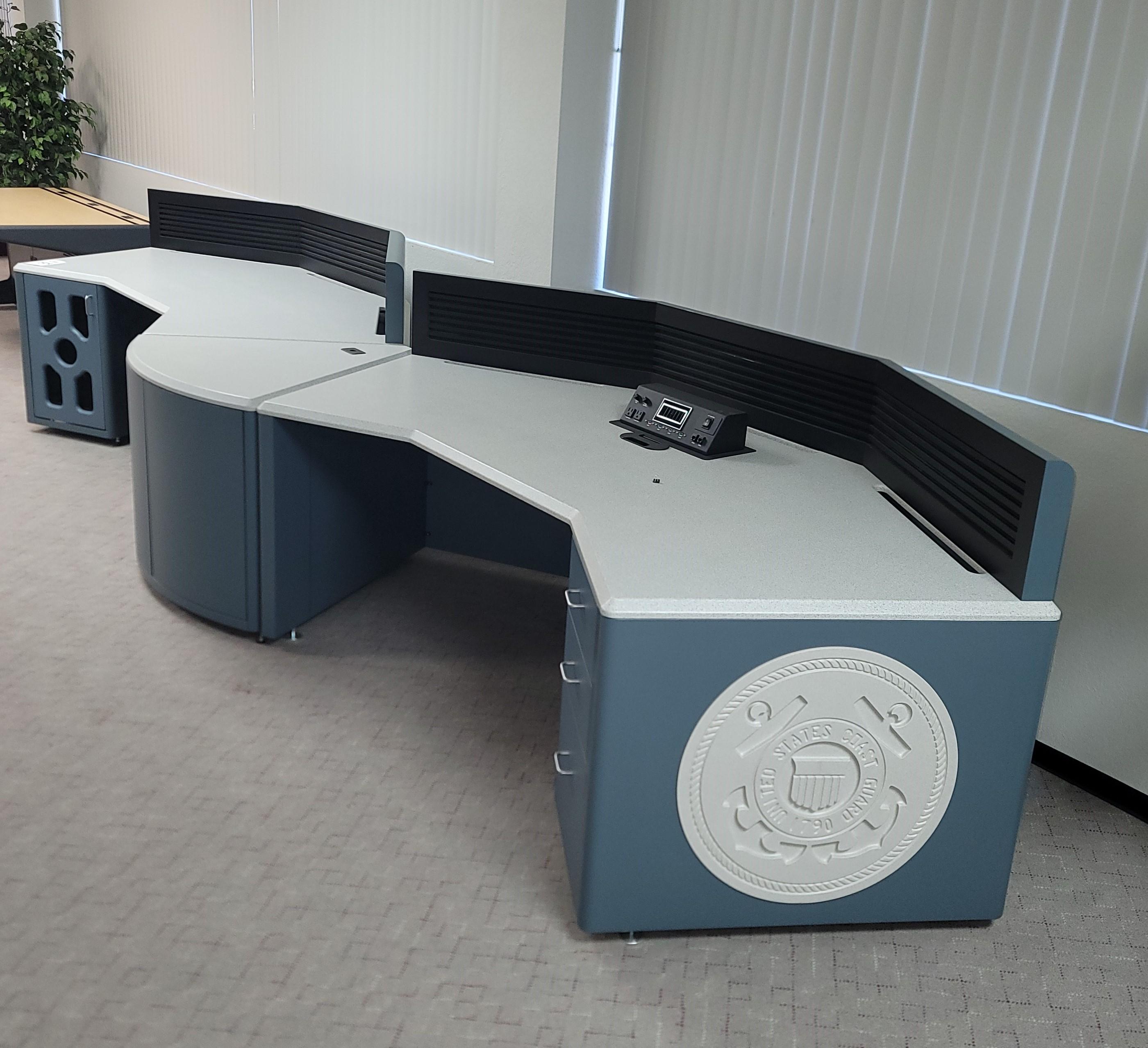 LOT - (2) COCKPIT STYLE GULLWING CONFIGURATIONS W/ HYDRAULIC LIFTING SYSTEM, SLATWALLS, CPU STORAGE, DRAWER PEDESTAL AND PIE-SHAPED TRANSITION, COLOR: GRANITE & STEEL BLUE-183