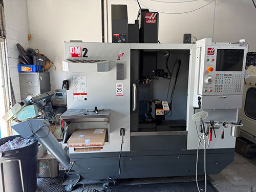 Haas-2022 HAAS DM-2 CNC VERTICAL DRILL/MILL MACHINING CENTER, MOLD MAKER, HAAS CNC CONTROL, TABLE: 34" X 15", XYZ TRAVELS: 28" X 16" X 15", CAT 40 TAPER, 15,000 RPM SPINDLE, SIDE MOUNT 18 ATC, 15 HP, THROUGH SPINDLE COOLANT, PROGRAMMABLE COOLANT NOZZLE, 32 GB EXPANDED MEMORY, WIRELESS INTUITIVE PROBING, TOOL AIR BLAST, CHIP CONVEYOR, 4TH AXIS READY, SUBPLATE, S/N 1197026-25