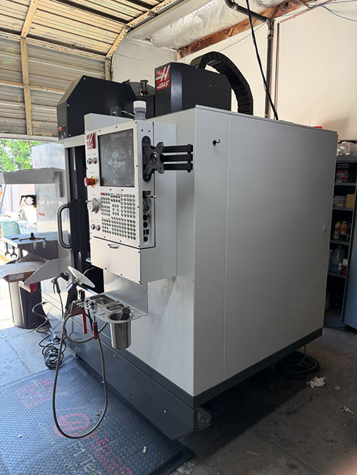 Haas-2022 HAAS DM-2 CNC VERTICAL DRILL/MILL MACHINING CENTER, MOLD MAKER, HAAS CNC CONTROL, TABLE: 34" X 15", XYZ TRAVELS: 28" X 16" X 15", CAT 40 TAPER, 15,000 RPM SPINDLE, SIDE MOUNT 18 ATC, 15 HP, THROUGH SPINDLE COOLANT, PROGRAMMABLE COOLANT NOZZLE, 32 GB EXPANDED MEMORY, WIRELESS INTUITIVE PROBING, TOOL AIR BLAST, CHIP CONVEYOR, 4TH AXIS READY, SUBPLATE, S/N 1197026-25