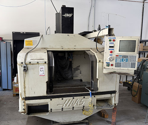 1992 HAAS VF-0 CNC VERTICAL MACHINING CENTER, TABLE: 26" X 14", XYZ TRAVELS: 20" X 16" X 20", CAT 40 TAPER, 7,500 RPM SPINDLE, 20 ATC, 7.5 HP, S/N 1870-34A