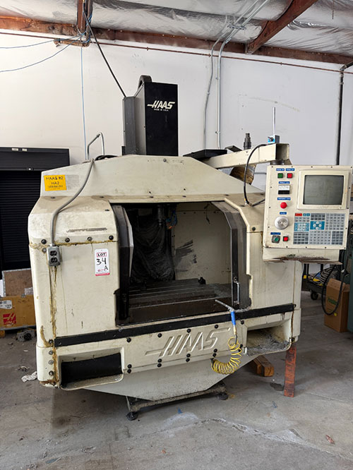 1992 HAAS VF-0 CNC VERTICAL MACHINING CENTER, TABLE: 26" X 14", XYZ TRAVELS: 20" X 16" X 20", CAT 40 TAPER, 7,500 RPM SPINDLE, 20 ATC, 7.5 HP, S/N 1870-34A