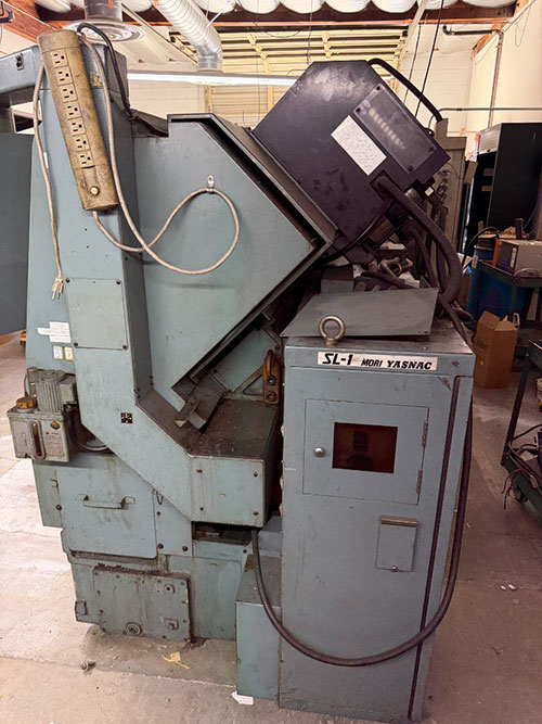 Mori Seiki-MORI SEIKI SL-1A CNC TURNING CENTER, YASNAC CNC CONTROL, 12-STATION TURRET, 6,000 RPM, MAX TURNING DIAMETER: 5.91", MAX TURNING LENGTH: 10.83", SWING OVER BED: 16.5", CHIP CONVEYOR, S/N 247-34B