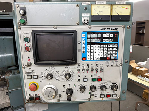 Mori Seiki-MORI SEIKI SL-1A CNC TURNING CENTER, YASNAC CNC CONTROL, 12-STATION TURRET, 6,000 RPM, MAX TURNING DIAMETER: 5.91", MAX TURNING LENGTH: 10.83", SWING OVER BED: 16.5", CHIP CONVEYOR, S/N 247-34B