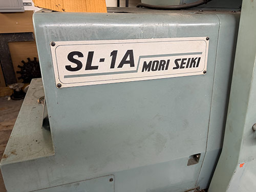 Mori Seiki-MORI SEIKI SL-1A CNC TURNING CENTER, YASNAC CNC CONTROL, 12-STATION TURRET, 6,000 RPM, MAX TURNING DIAMETER: 5.91", MAX TURNING LENGTH: 10.83", SWING OVER BED: 16.5", CHIP CONVEYOR, S/N 247-34B