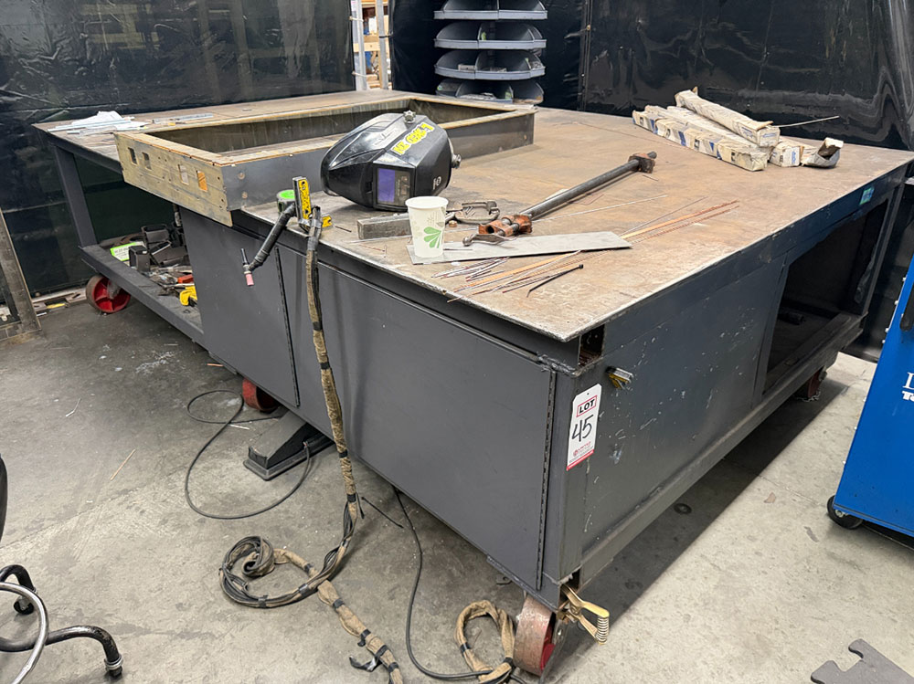 WELDING TABLE W/ 6-1/2' X 10' X 1/2" THICK TOP, 36" TOP HT, STEEL CASTERS, CONTENTS NOT INCLUDED-45