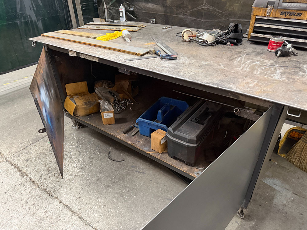 WELDING TABLE W/ 4' X 8' X 3/8" THICK TOP, 38" TOP HT, STEEL CASTERS, CONTENTS NOT INCLUDED-46