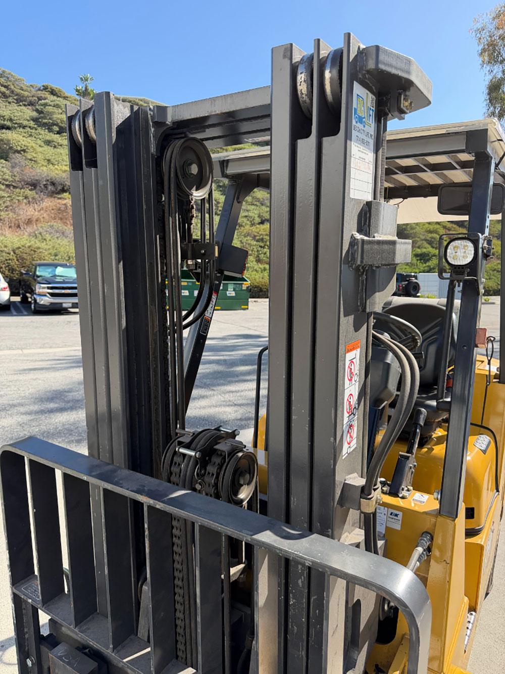 2023 CATERPILLAR LPG FORKLIFT, MODEL GC40K, 8,000 LB CAPACITY, 3-STAGE MAST, SIDE SHIFT, 8' FORKS, SOLID CUSHION TIRES, LOAD LIGHTS, REARVIEW MIRRORS, CLEARCAP RAINCAP, APPROX. 498 HOURS, S/N AT87B11599-63