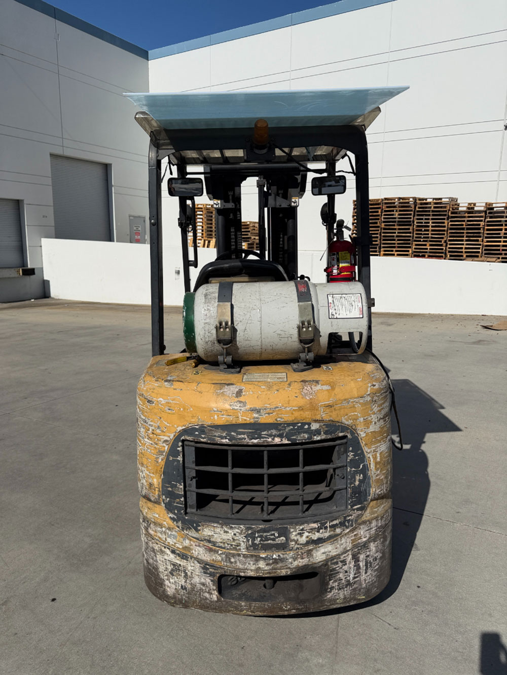 2004 CATERPILLAR LPG FORKLIFT, MODEL GC30K, 6,000 LB CAPACITY, 4-STAGE MAST, SIDE SHIFT, 5' FORKS, SOLID CUSHION TIRES, LOAD LIGHTS, REARVIEW MIRRORS, REAR SAFETY BEACON, CLEARCAP RAINCAP, APPROX. 8,077 HOURS, S/N AT83E00502, (DELAYED PICKUP UNTIL TUESDAY, AUGUST 18)-64