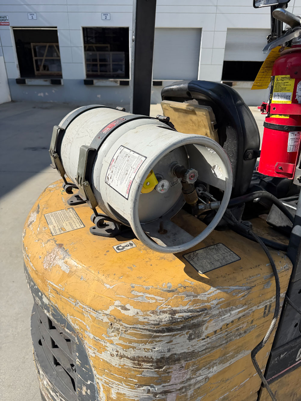 2004 CATERPILLAR LPG FORKLIFT, MODEL GC30K, 6,000 LB CAPACITY, 4-STAGE MAST, SIDE SHIFT, 5' FORKS, SOLID CUSHION TIRES, LOAD LIGHTS, REARVIEW MIRRORS, REAR SAFETY BEACON, CLEARCAP RAINCAP, APPROX. 8,077 HOURS, S/N AT83E00502, (DELAYED PICKUP UNTIL TUESDAY, AUGUST 18)-64