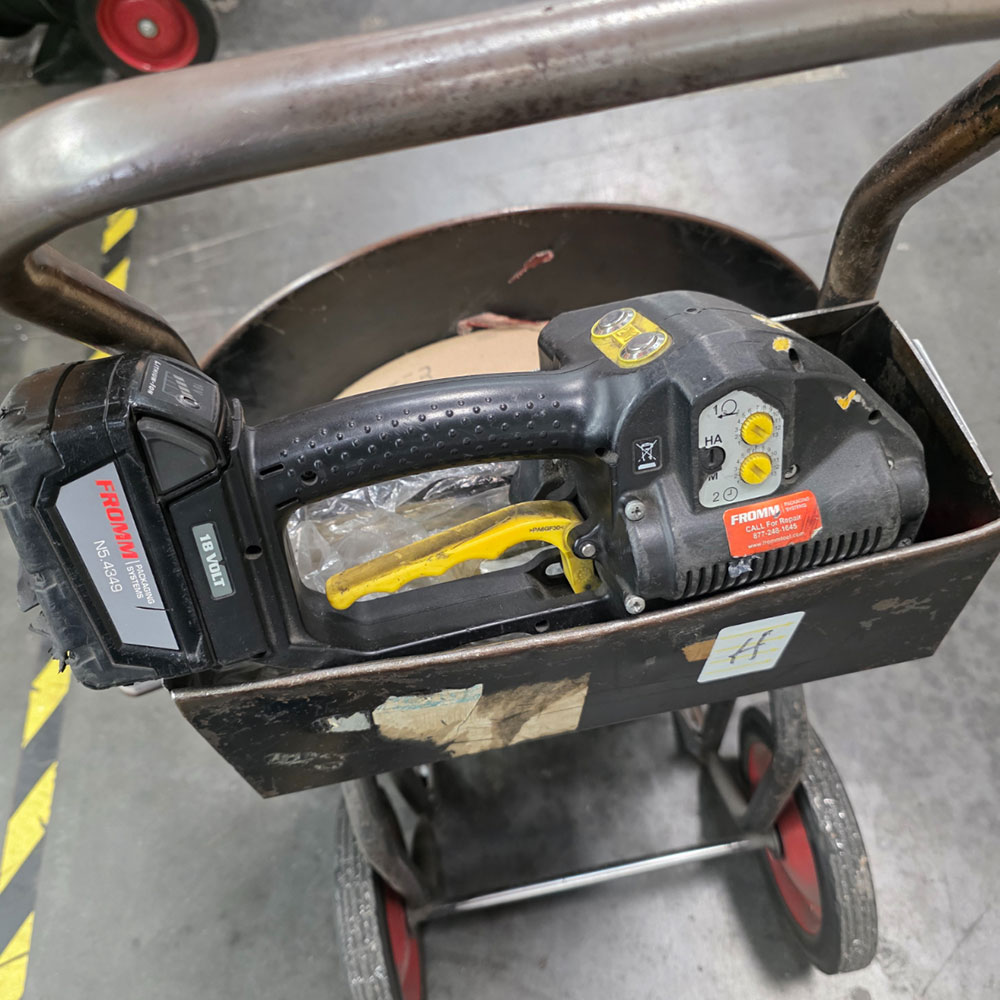 LOT - BANDING CART W/ 1/2" POLY BANDING, W/ FROMM 18 VOLT RECHARGEABLE PLASTIC STRAPPING TOOL, MODEL P328-75