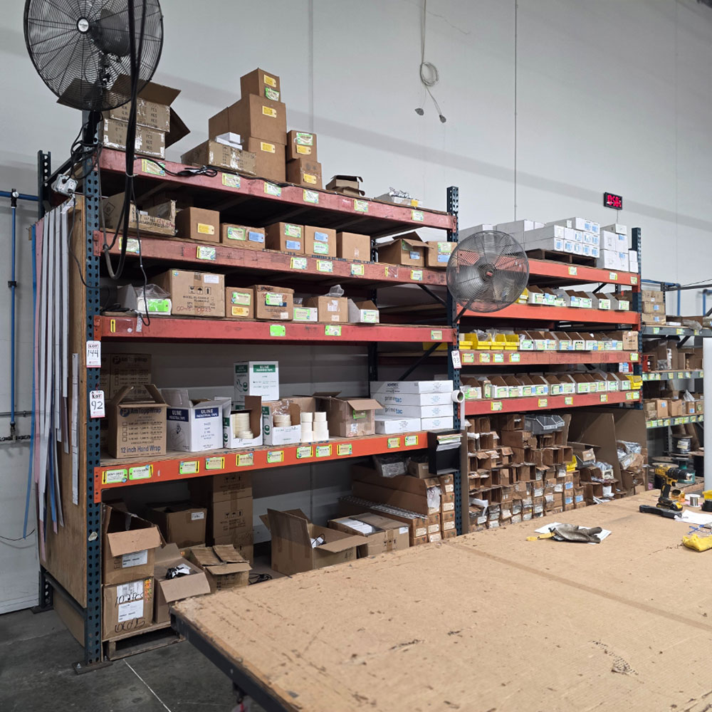 LOT - (2) SECTIONS OF PALLET RACKING, 10' BEAMS, 4' X 11' UPRIGHTS, PLYWOOD DECKING, CONTENTS NOT INCLUDED-144