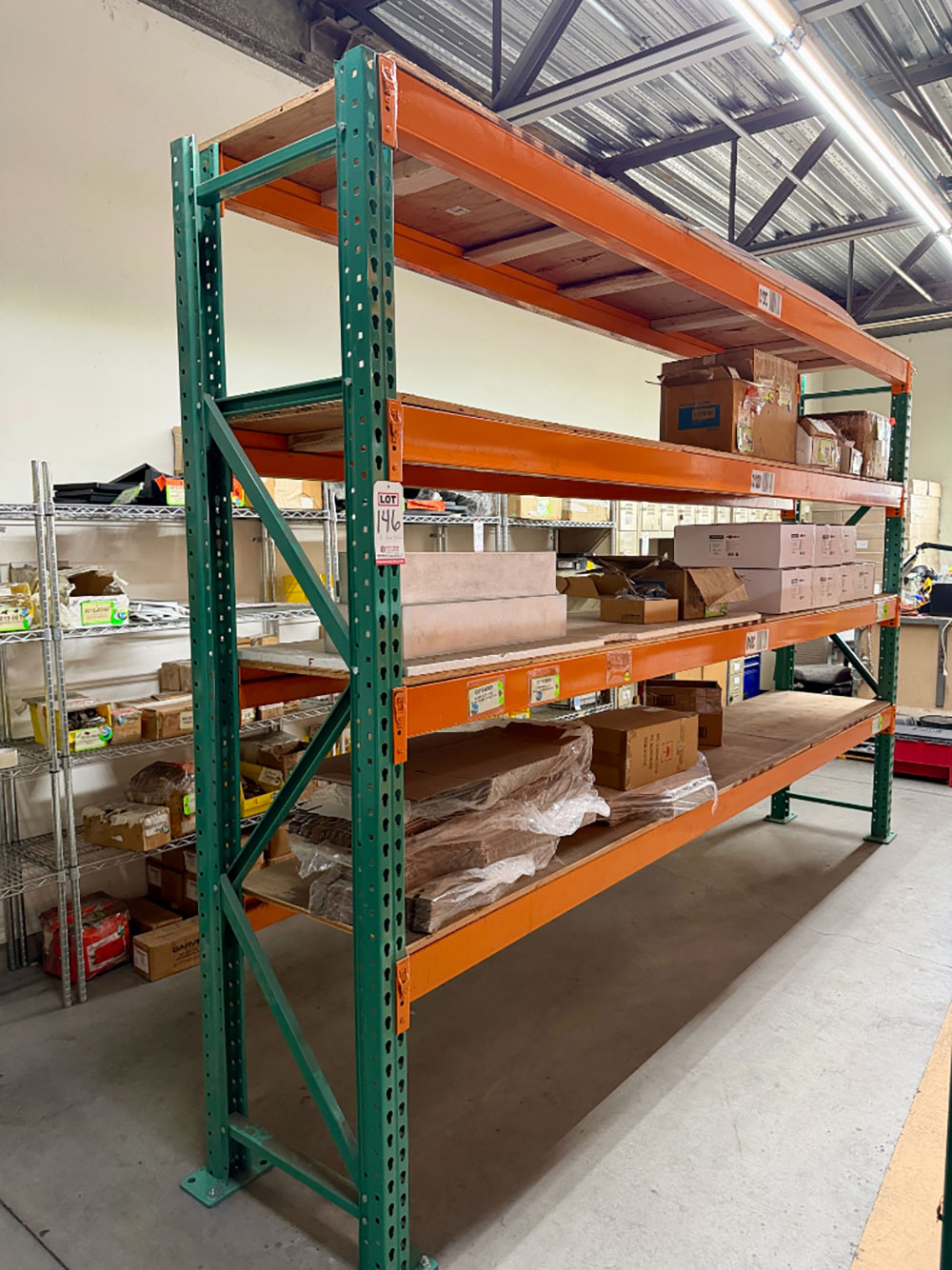 LOT - (1) SECTION OF HEAVY DUTY SHELVING, 12' BEAMS, 2' X 8' UPRIGHTS, PLYWOOD DECKING, CONTENTS NOT INCLUDED-146