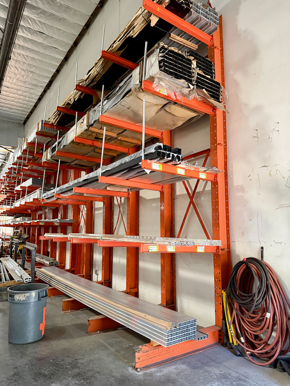 LOT - (3) 17' CANTILEVER MATERIAL RACKS W/ CROSS BRACING, 4' ARMS, 16' TOTAL HT, CONTENTS NOT INCLUDED-153