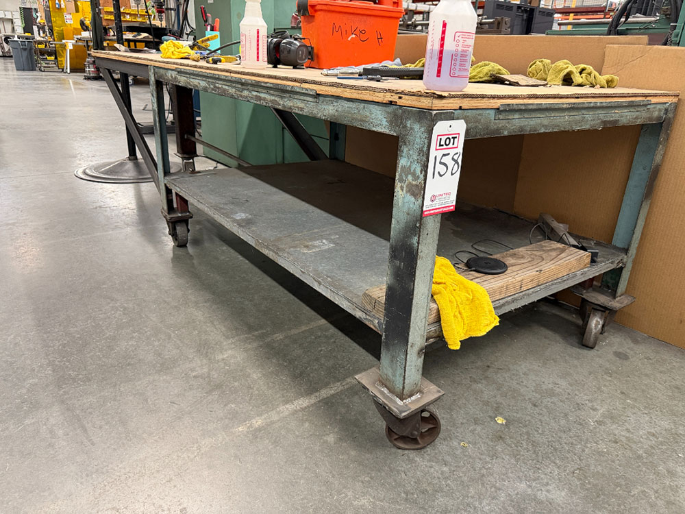 STEEL TABLE ON CASTERS W/ 8'-5" X 3' WOOD TOP, 31" TOP HT, CONTENTS NOT INCLUDED-158