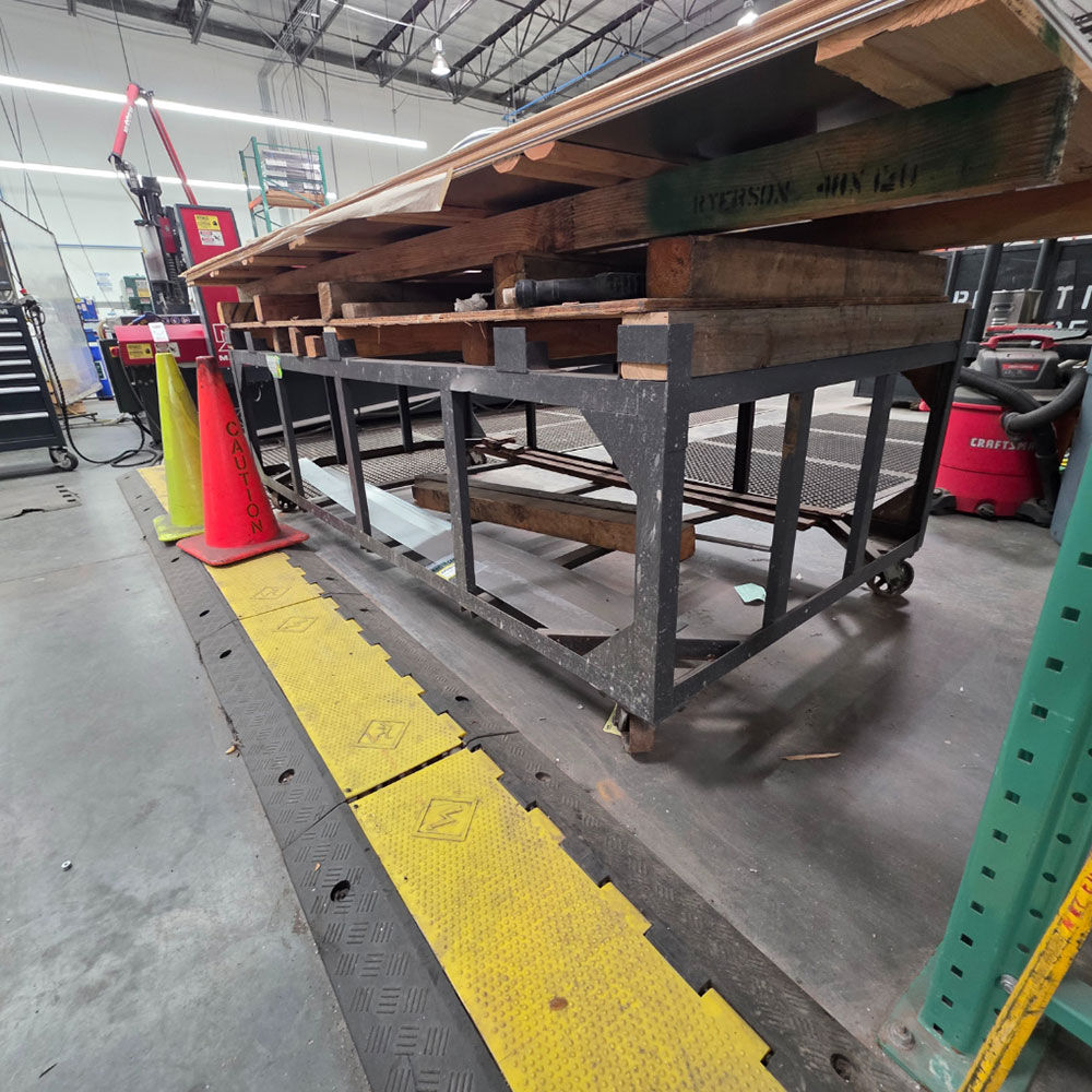 STEEL TABLE ON CASTERS, 8' X 4', CONTENTS NOT INCLUDED-165