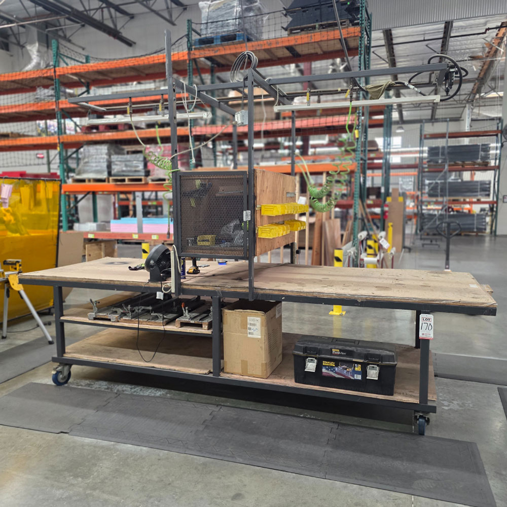 STEEL TABLE ON CASTERS W/ 12' X 4' WOOD TOP, 37" TOP HT, CONTENTS NOT INCLUDED-170