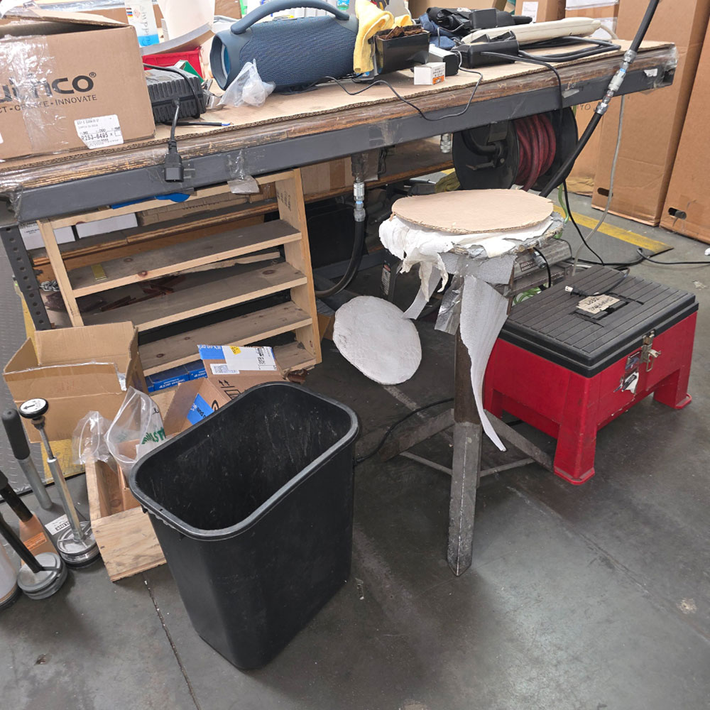STEEL TABLE ON CASTERS W/ 14' X 5' WOOD TOP, CONTENTS NOT INCLUDED-215