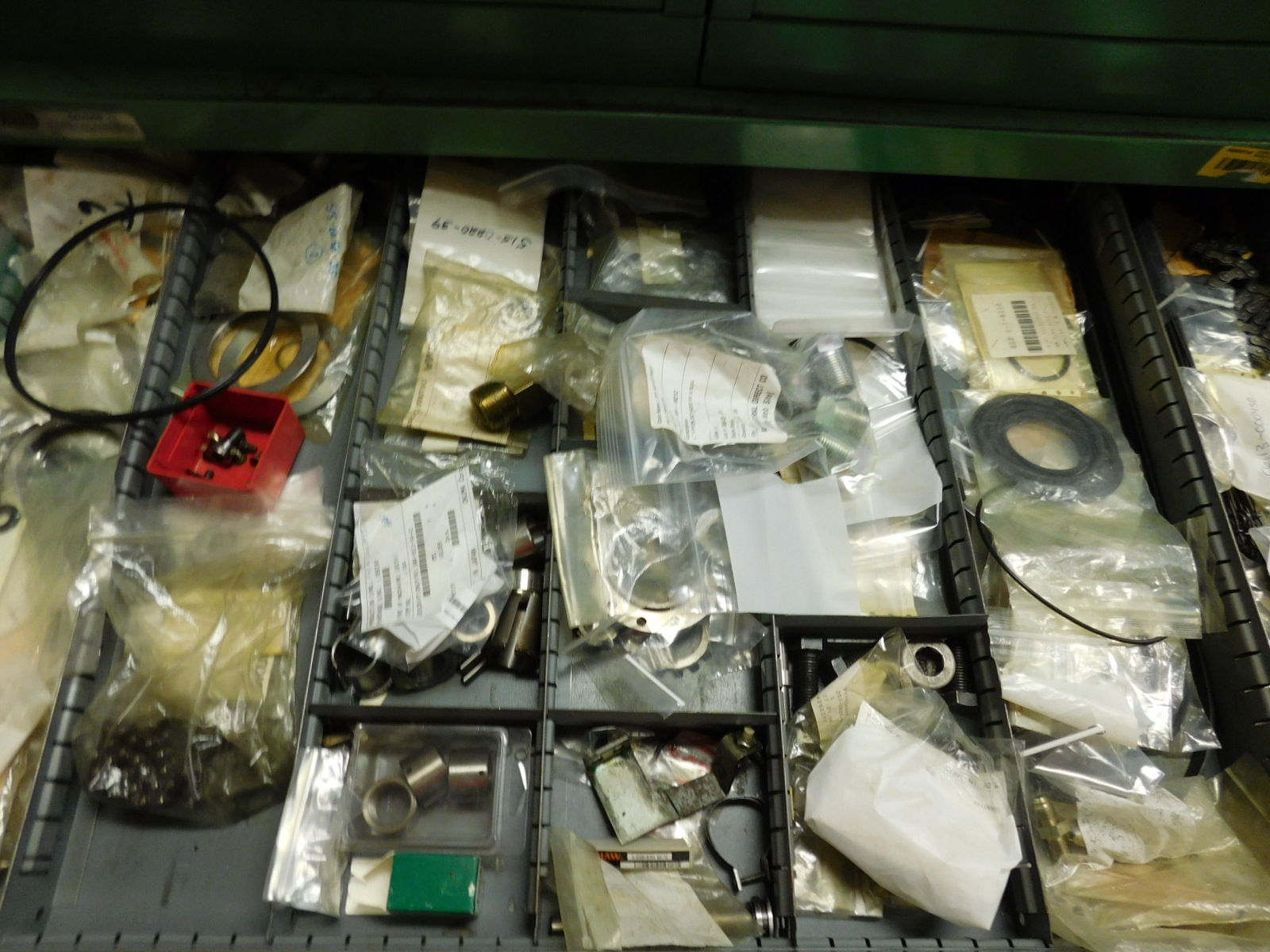 DOUBLE-SIDED ISLAND AREA: 5'X16'X8'! HIGHLIGHTS: GREEN OKUMA PARTS CABINET ENDCAP! (2) 7'X2'X8' SHELF UNITS FULL OF ASSORTED PARTS & PIECES: VARIOUS DIAMETERS OF SOFT COPPER PIPE ROLLS, BIG MACHINE DRIVE SCREWS, WELDING REGULATORS, 6 LISTA CABINETS, 28"X28"X60" & 2 STANLEY VIDMAR 30"X28"X66"CABINETS FULL OF ALL TYPES/SIZES OF BEARINGS, BAND HEATERS, VARIOUS SIZES OF LINK BELT CHAIN LENGTHS, SCHRADER BELLOWS PARTS, ELECTRONIC PARTS, CIRCUIT BOARDS, SELF FEED PARTS/TOOLS, RUBBER DRIVE BELTS, HOLE SAVERS,MOKON PARTS, SANDBLAST PARTS, LATHE PARTS, AIR LINE REGULATORS/LUBRICATORS, LIGHT BULBS, WELDING ACCESSORIES, ETC. - TOO MUCH TO LIST - COME SEE IT ALL, OR VIEW PHOTOS!-351