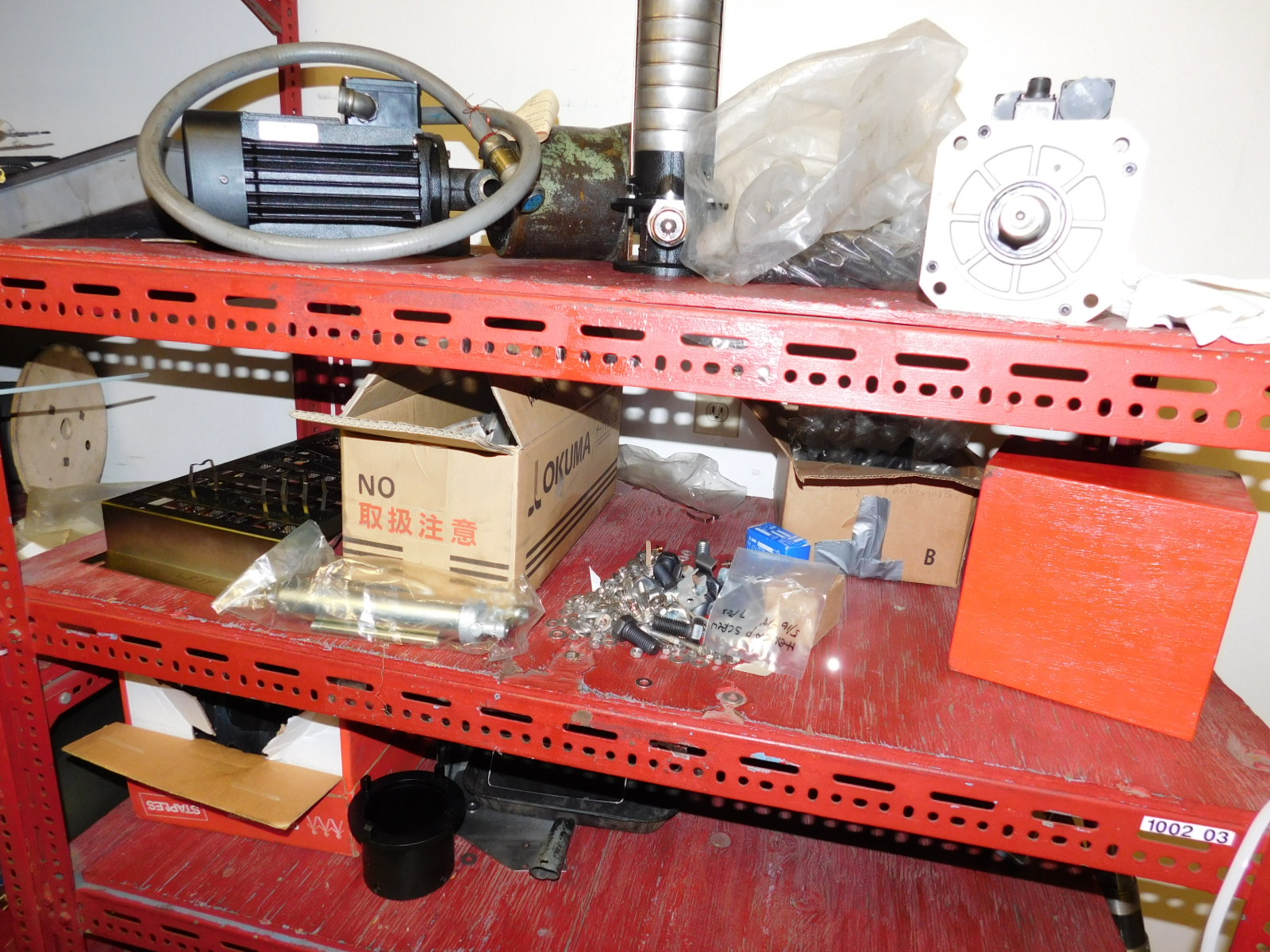 LOT OF (2) SECTIONS OF RED SHELVING W/CONTENTS (SEE PHOTOS)-352