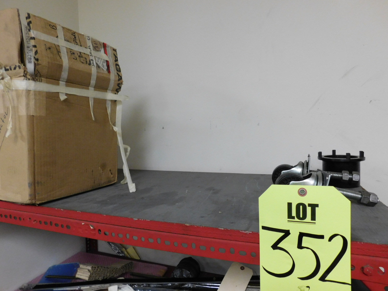 LOT OF (2) SECTIONS OF RED SHELVING W/CONTENTS (SEE PHOTOS)-352