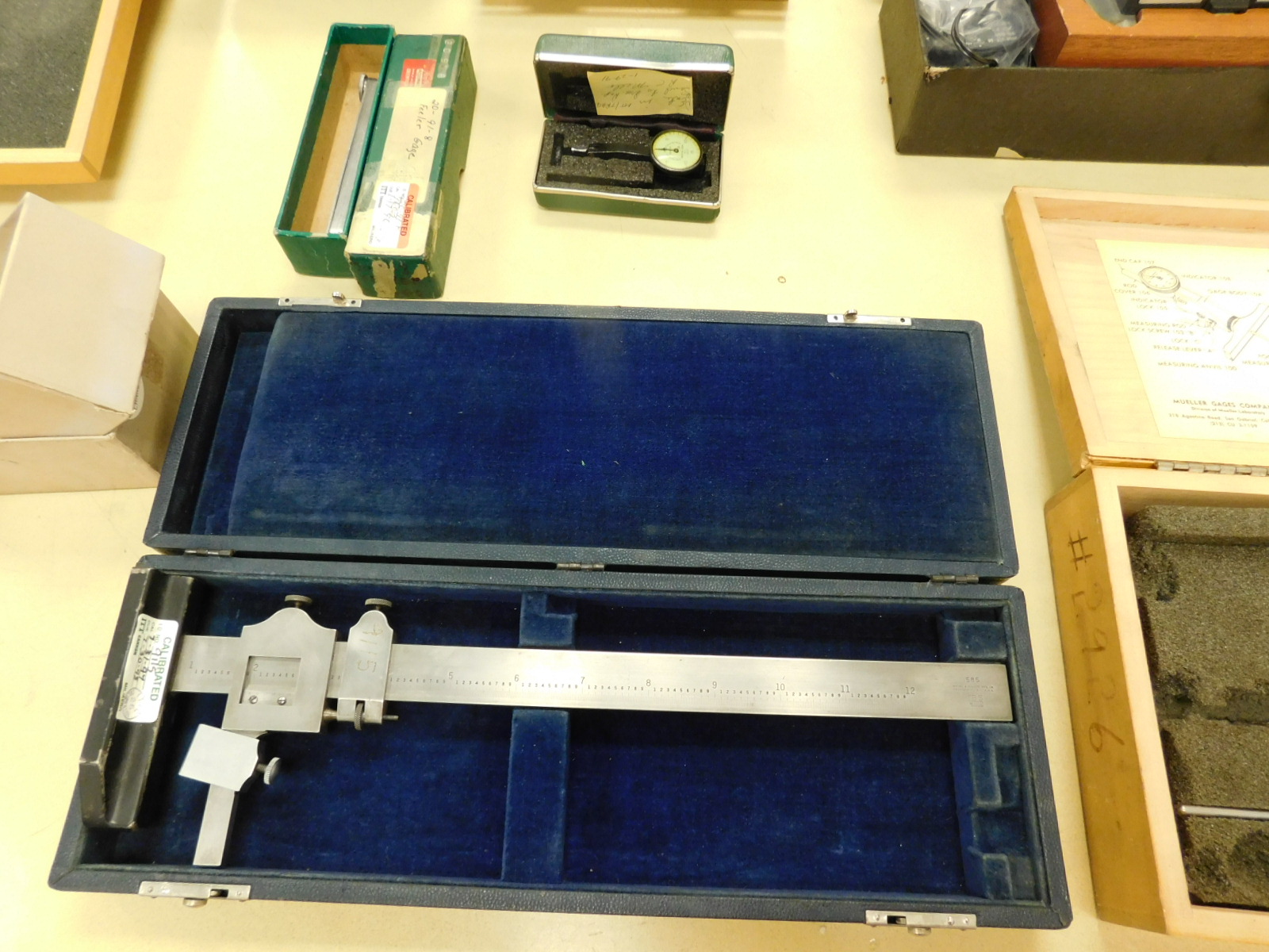 BROWN & SHARPE VERNIER HEIGHT GAGE, (2) NEW-IN-BOX STARRETT 25-5041J DIAL INDICATORS, (3) USED STARRETT DIAL INDICATORS, BROWN & SHARPE DIGI-CAL DIGITAL CALIPERS, BROWN & SHARPE 585 12" HEIGHT GAGE, PLUS SEVERAL DEPTH GAGES-369