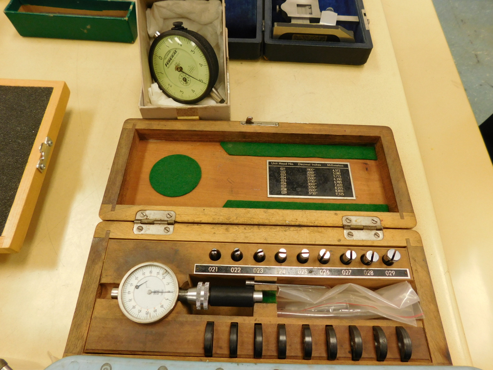 BROWN & SHARPE VERNIER HEIGHT GAGE, (2) NEW-IN-BOX STARRETT 25-5041J DIAL INDICATORS, (3) USED STARRETT DIAL INDICATORS, BROWN & SHARPE DIGI-CAL DIGITAL CALIPERS, BROWN & SHARPE 585 12" HEIGHT GAGE, PLUS SEVERAL DEPTH GAGES-369