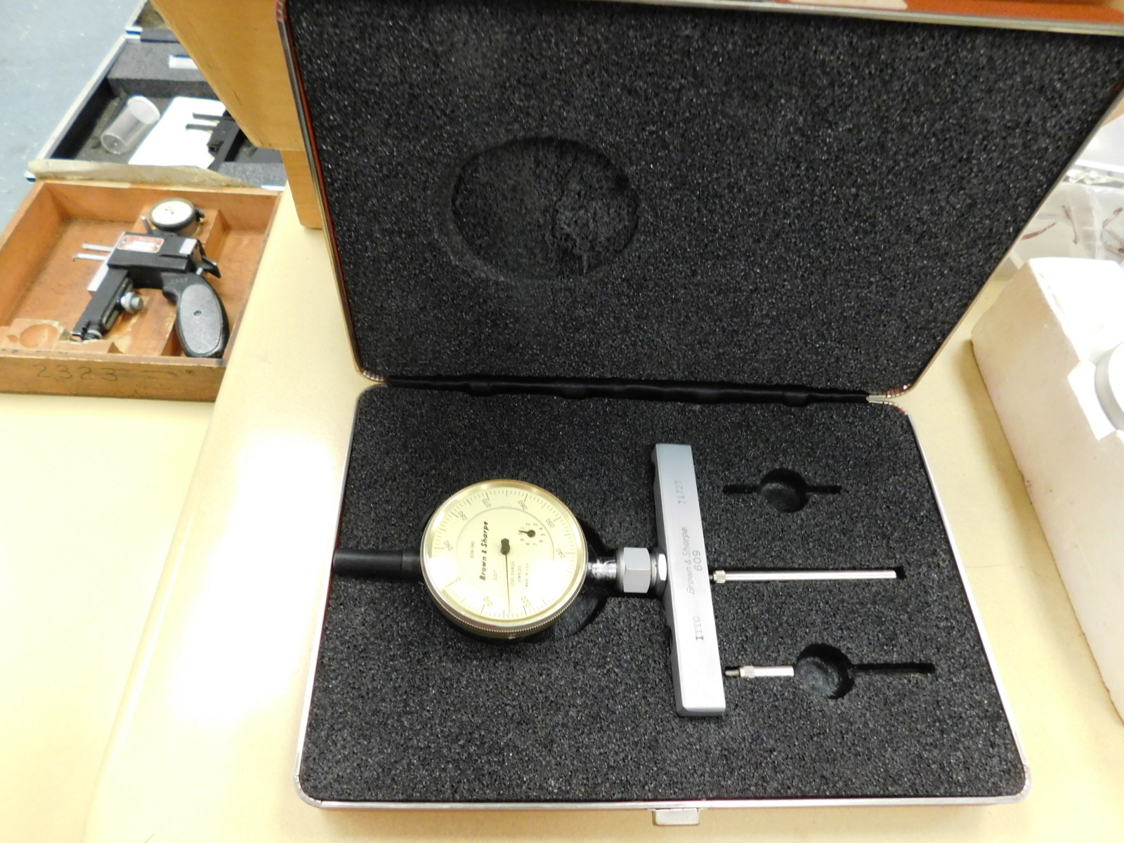 BROWN & SHARPE VERNIER HEIGHT GAGE, (2) NEW-IN-BOX STARRETT 25-5041J DIAL INDICATORS, (3) USED STARRETT DIAL INDICATORS, BROWN & SHARPE DIGI-CAL DIGITAL CALIPERS, BROWN & SHARPE 585 12" HEIGHT GAGE, PLUS SEVERAL DEPTH GAGES-369