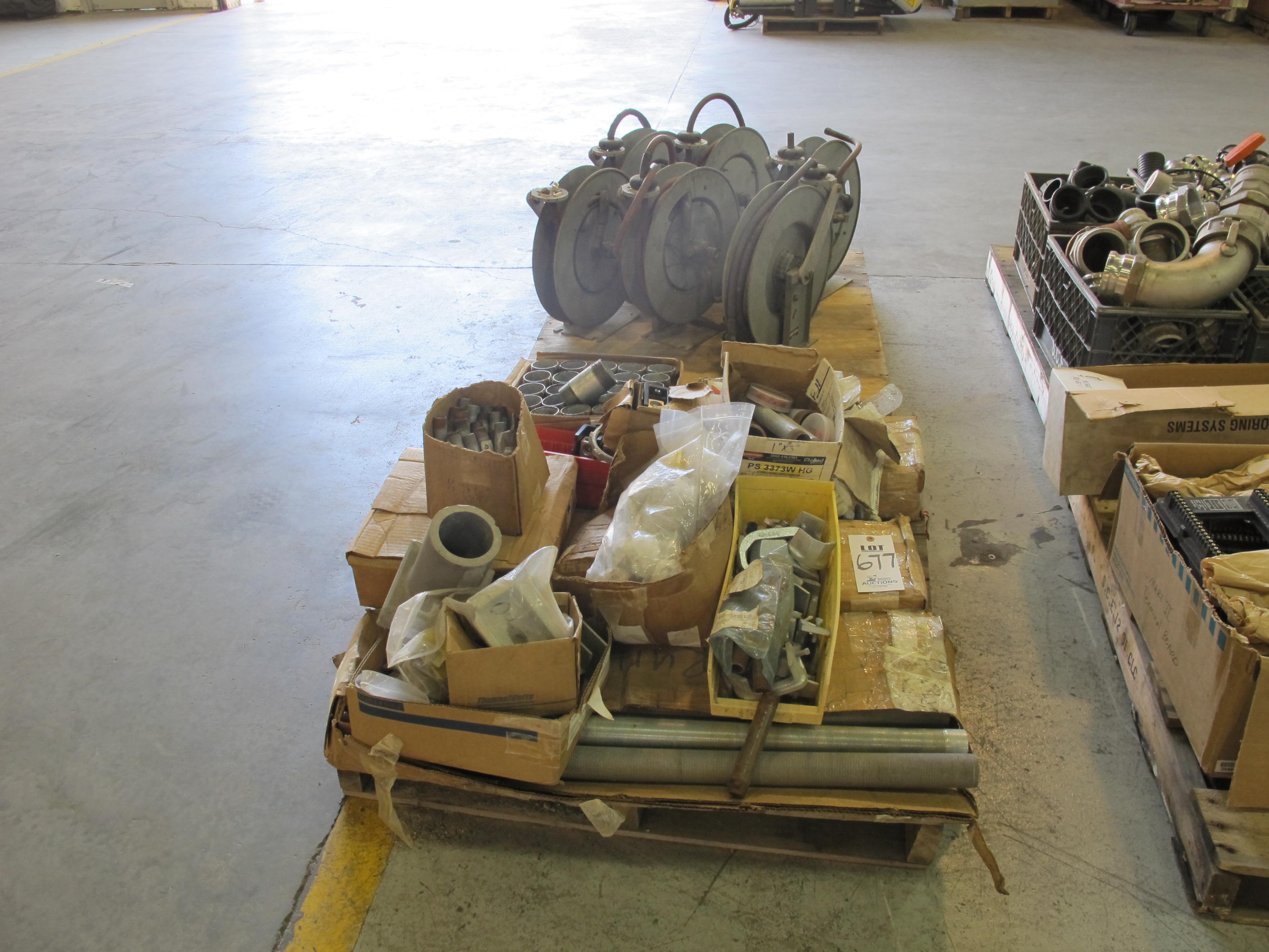 LOT (2) PALLETS ASSORTED PLUMBING SUPPLIES & AIR HOSE REELS (G-49) LOADING & HANDLING FEE $30-