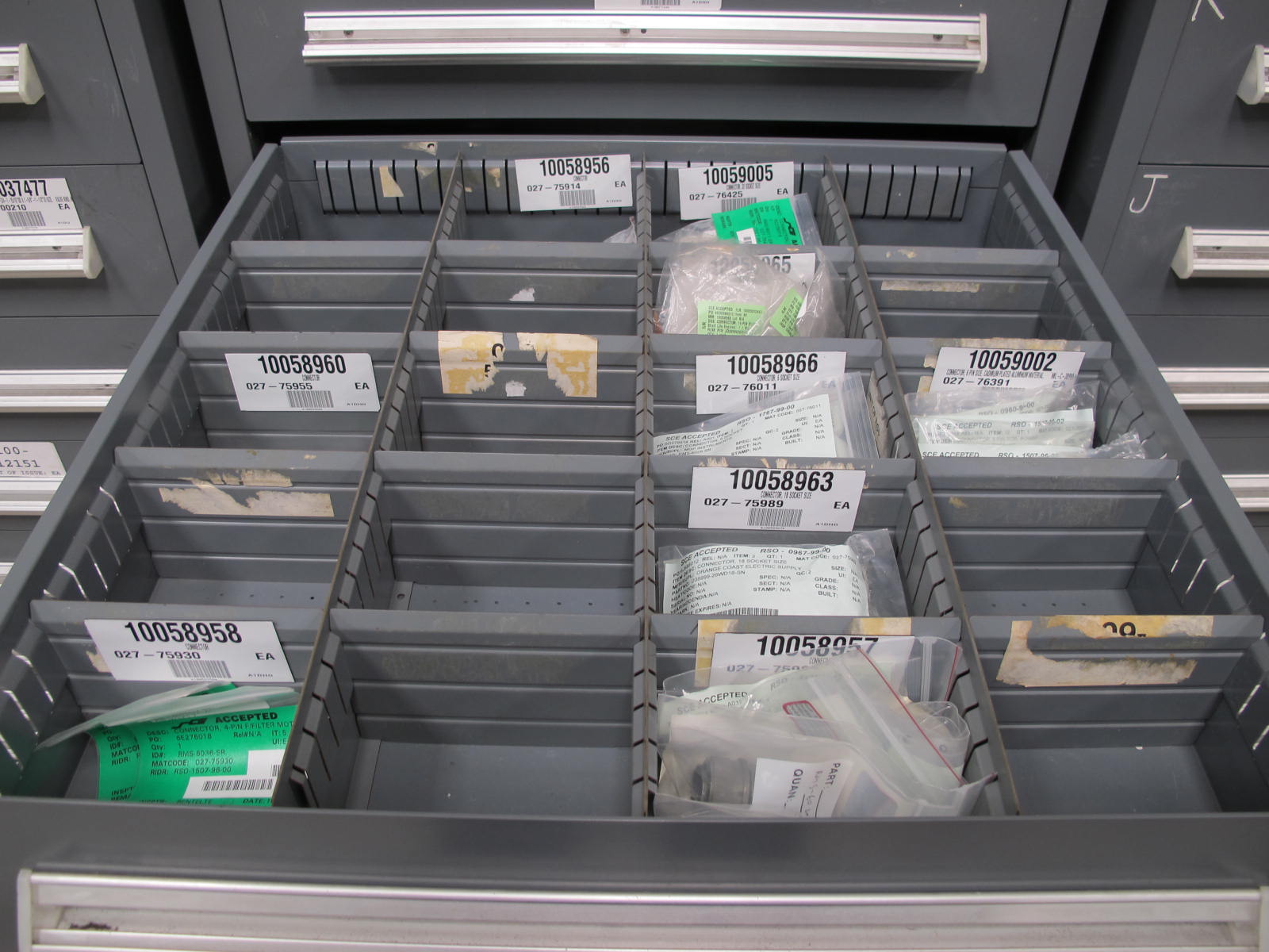 STANLEY VIDMAR CABINET, 8 DRAWER, TO INCLUDE: AIR FILTERS, RELAYS, CONNECTORS. LOCATED AT W-44. LOADING AND HANDLING FEE $25-351