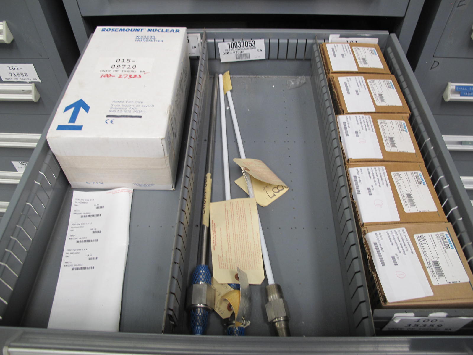 STANLEY VIDMAR CABINET, 5 DRAWER, TO INCLUDE: RELIEF VALVES, ELECTRICAL CONNECTORS, PRINTED CIRCUIT BOARDS, UNDER VOLTAGE DEVICES, MECHANICAL SPLICERS. LOCATED AT W-44. LOADING AND HANDLING FEE $25-353