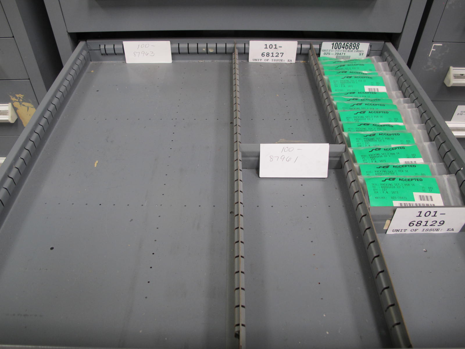 STANLEY VIDMAR CABINET, 5 DRAWER, TO INCLUDE: HYDRAULIC ADJUSTERS, PROBES, PRINTED CIRCUIT BOARDS, HEX NUTS. LOCATED AT W-44. LOADING AND HANDLING FEE $25-354
