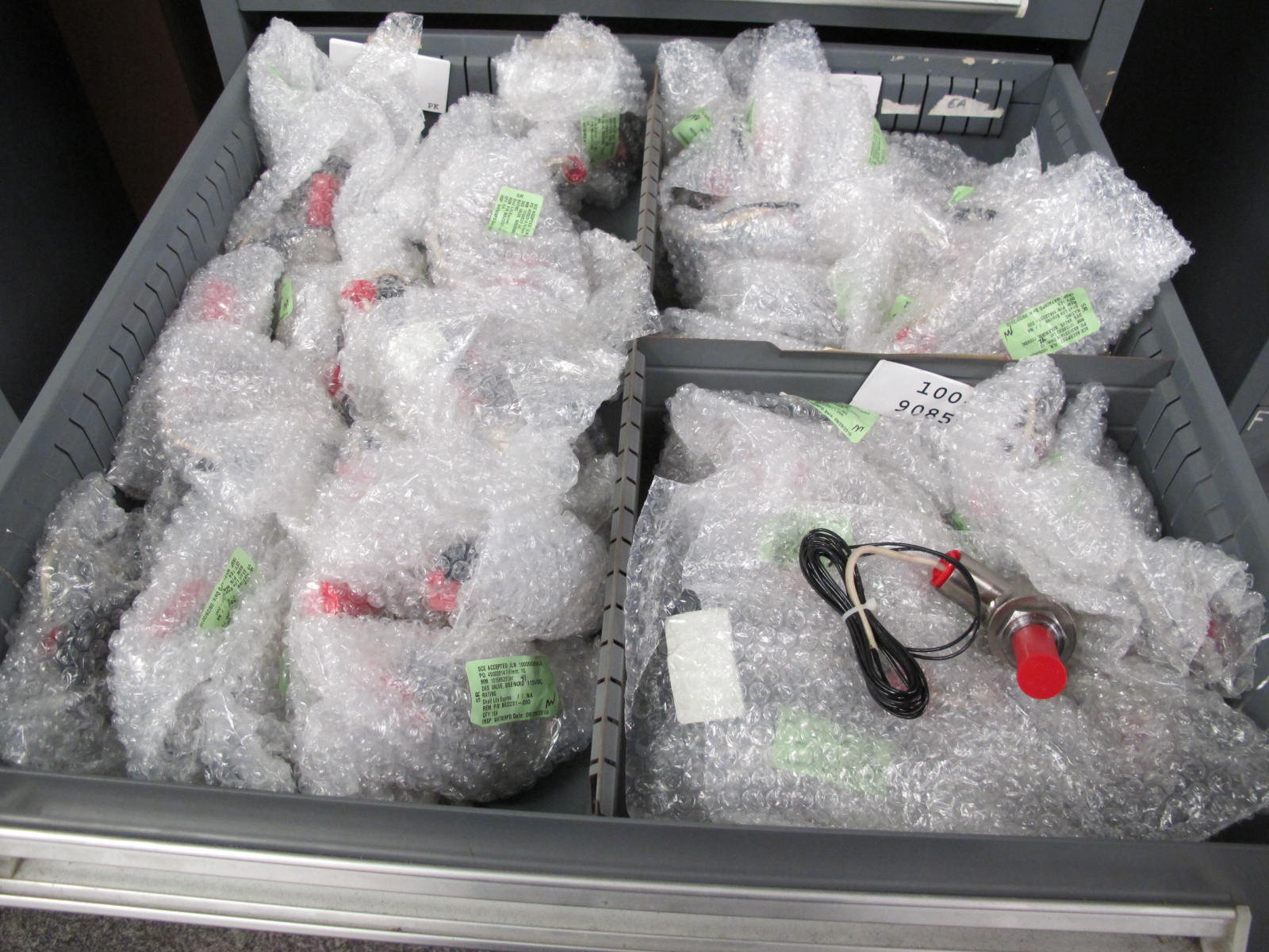 STANLEY VIDMAR CABINET, 5 DRAWER, TO INCLUDE: PIPE NIPPLES, CONNECTORS, SOLENOID VALVES, PRINTED CIRCUIT BOARDS. LOCATED AT W-44. LOADING AND HANDLING FEE $25-359