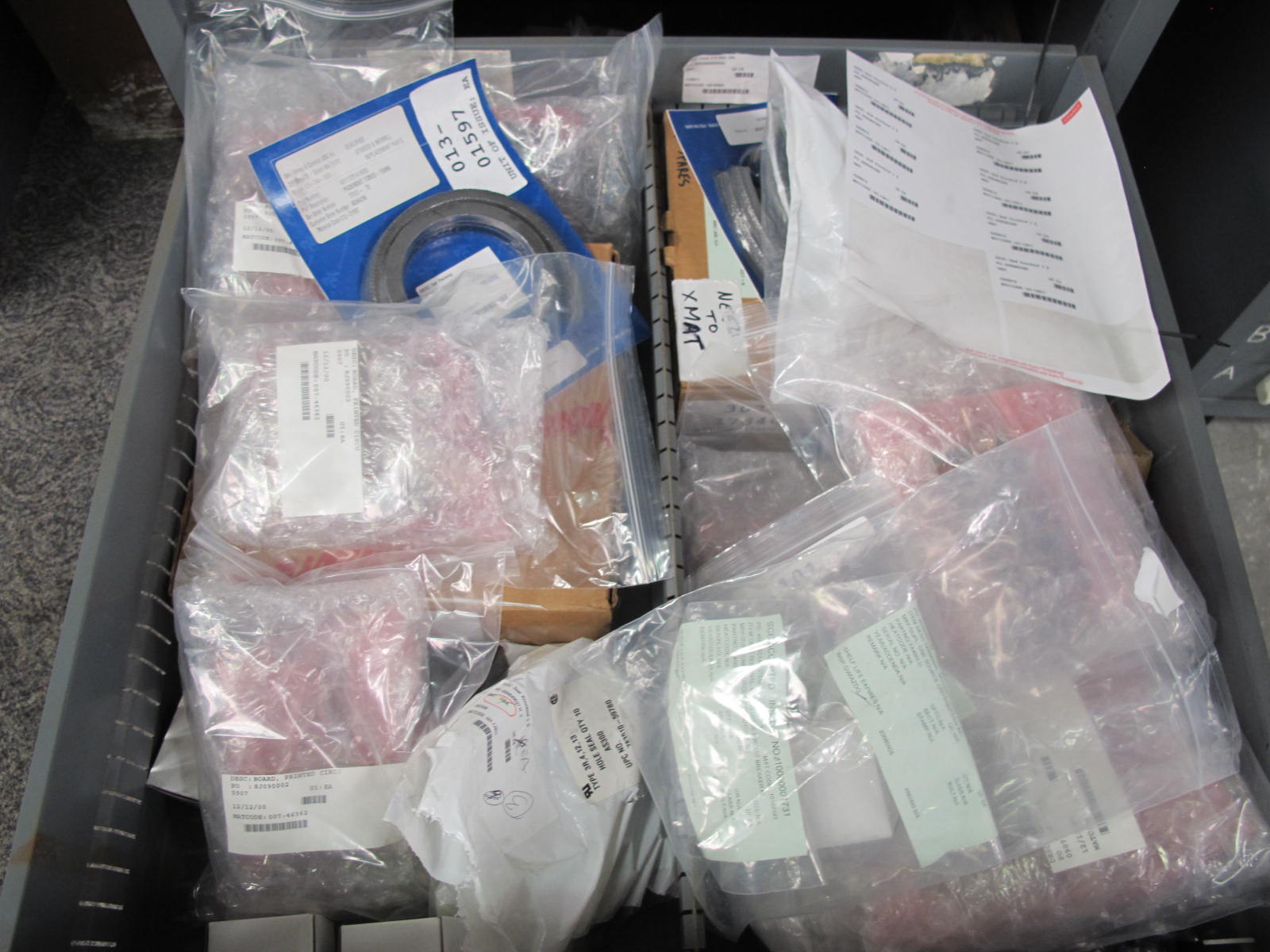 STANLEY VIDMAR CABINET, 5 DRAWER, TO INCLUDE: PIPE NIPPLES, CONNECTORS, SOLENOID VALVES, PRINTED CIRCUIT BOARDS. LOCATED AT W-44. LOADING AND HANDLING FEE $25-359