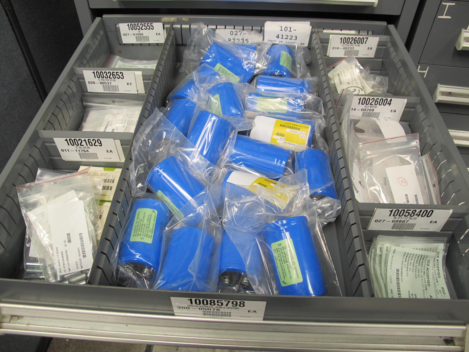 STANLEY VIDMAR CABINET, 5 DRAWER, TO INCLUDE: SWITCH ASSEMBLY, TERMINAL BLOCK, CAPACITORS, ANCHORS, COMPRESSION RINGS. LOCATED AT W-44. LOADING AND HANDLING FEE $25-361