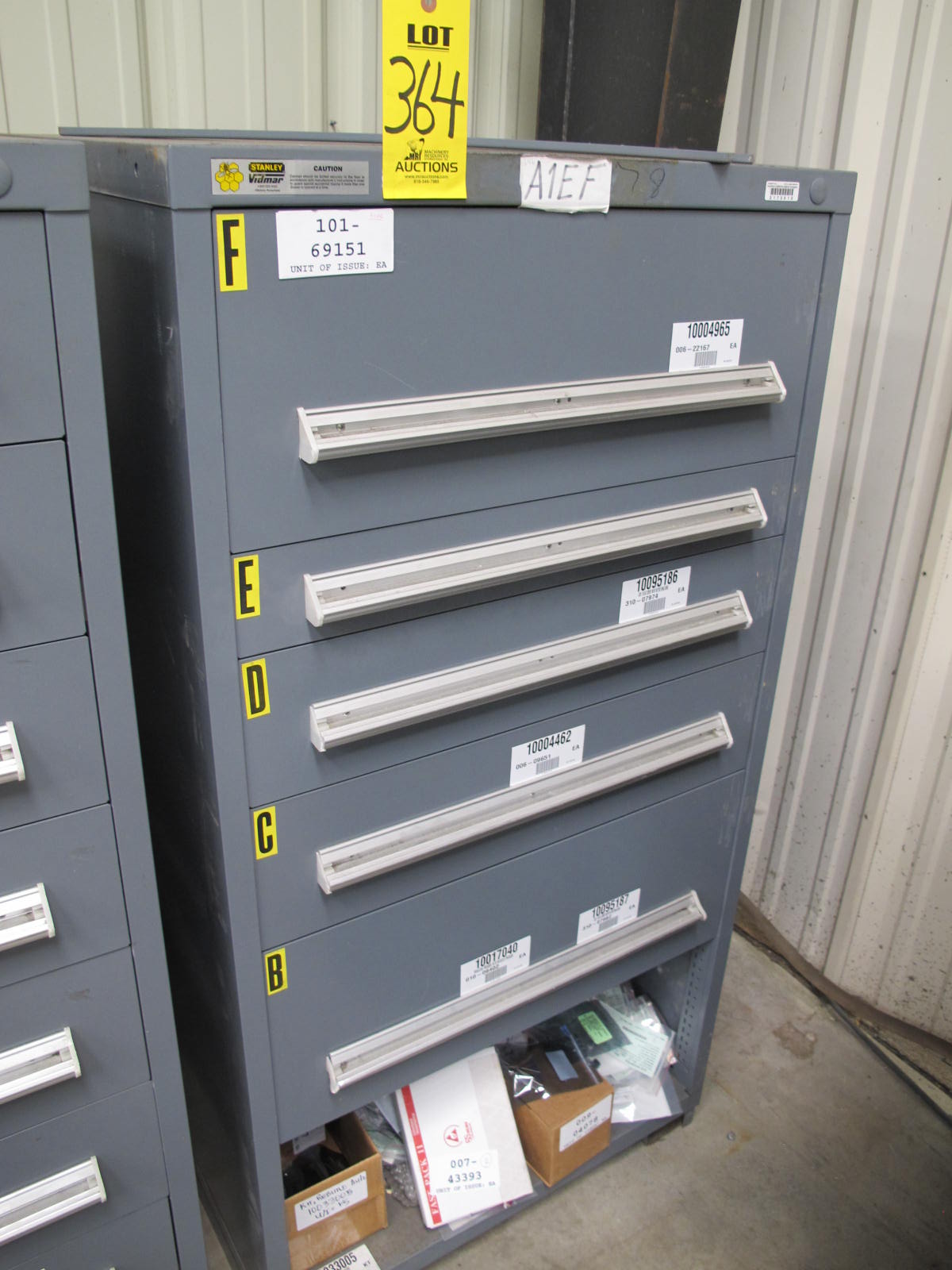 STANLEY VIDMAR CABINET, 5 DRAWER, TO INCLUDE: BATTERIES, PRESSURE REGULATORS, FUSES, GLAND VALVES, CONNECTORS, COMPRESSOR VALVES, . LOCATED AT W-44. LOADING AND HANDLING FEE $25-364