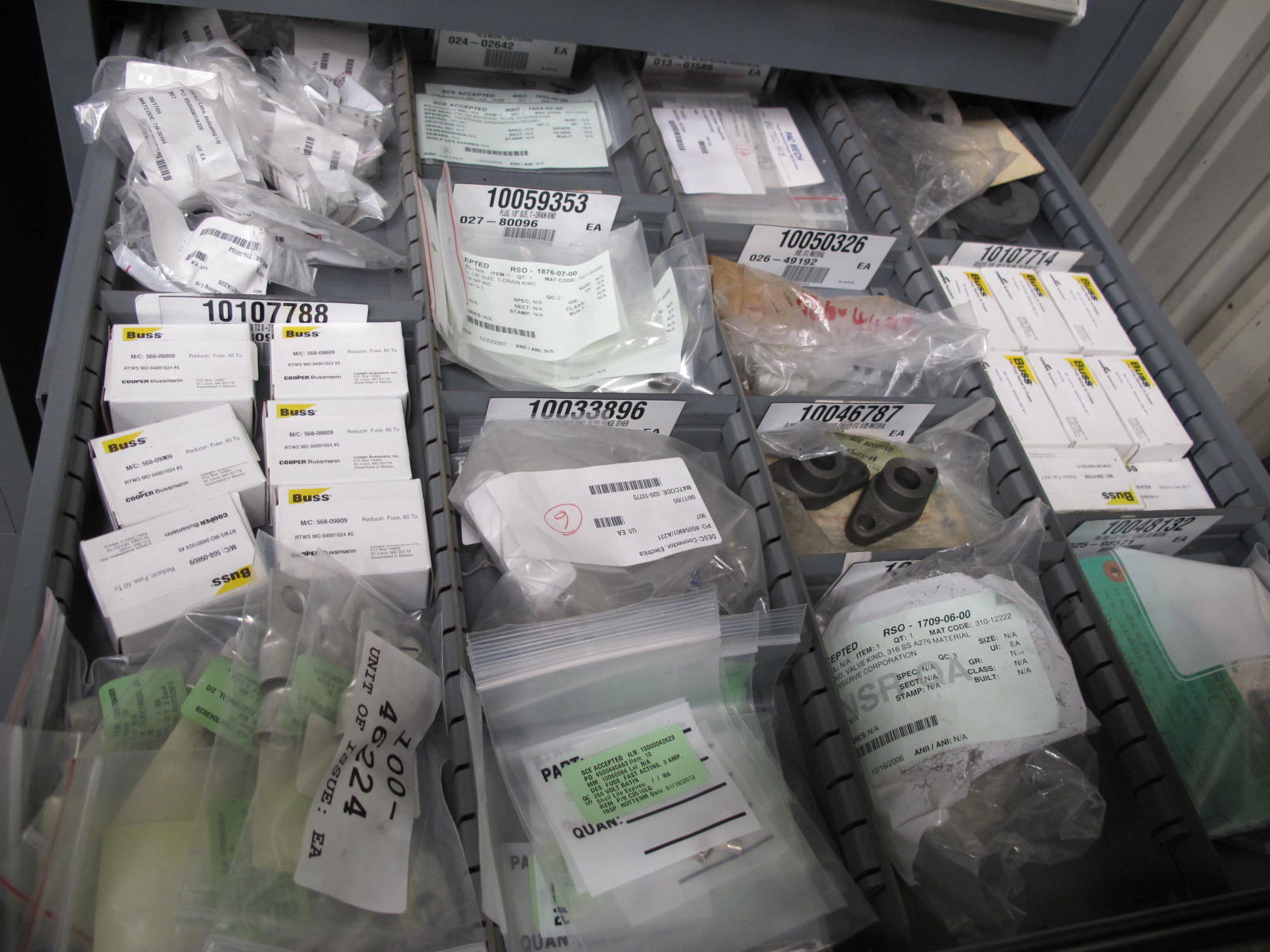 STANLEY VIDMAR CABINET, 5 DRAWER, TO INCLUDE: BATTERIES, PRESSURE REGULATORS, FUSES, GLAND VALVES, CONNECTORS, COMPRESSOR VALVES, . LOCATED AT W-44. LOADING AND HANDLING FEE $25-364