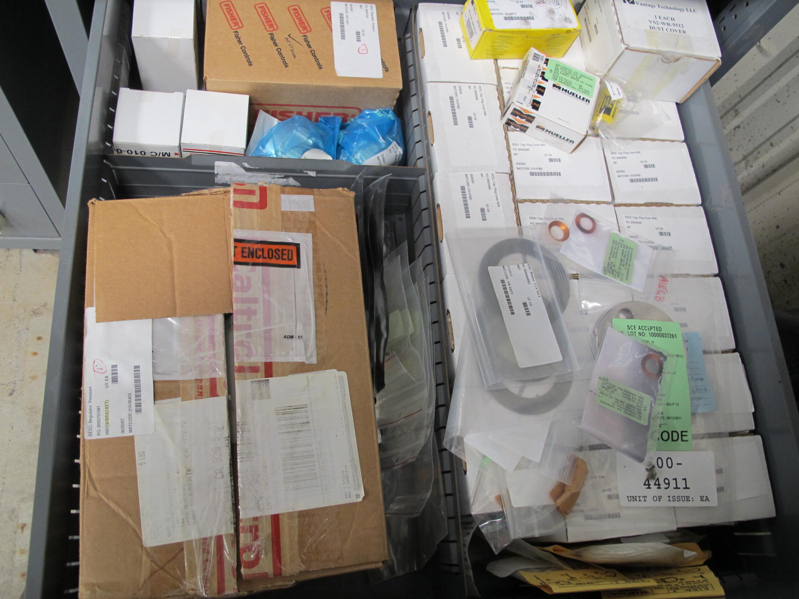 STANLEY VIDMAR CABINET, 5 DRAWER, TO INCLUDE: BATTERIES, PRESSURE REGULATORS, FUSES, GLAND VALVES, CONNECTORS, COMPRESSOR VALVES, . LOCATED AT W-44. LOADING AND HANDLING FEE $25-364